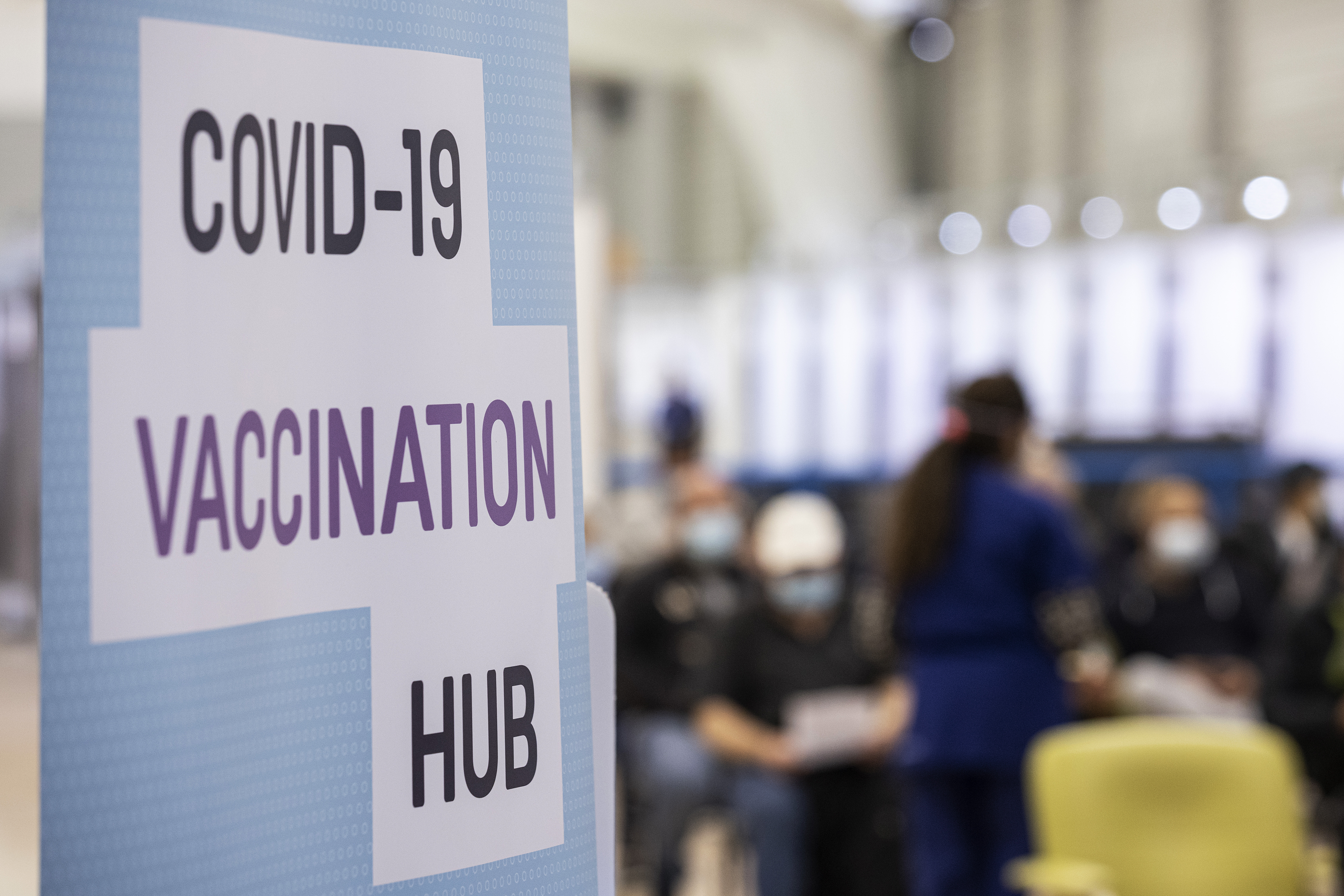 MELBOURNE, AUSTRALIA - JULY 20: People wait for 15 minutes after receiving a COVID-19 vaccine at the Melbourne Showgrounds COVID-19 Vaccination Centre on July 20, 2021 in Melbourne, Australia. Premier Daniel Andrews has announced a 7 day extension on the lockdown in Victoria, as the state continues to record new community COVID-19 cases and work to stop the spread of the highly infectious delta coronavirus strain in the community. (Photo by Daniel Pockett/Getty Images)