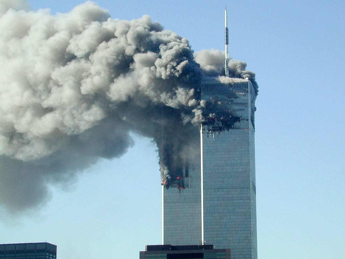 Smoke pours from the World Trade Center after being hit by two planes on the morning of September 11, 2001.