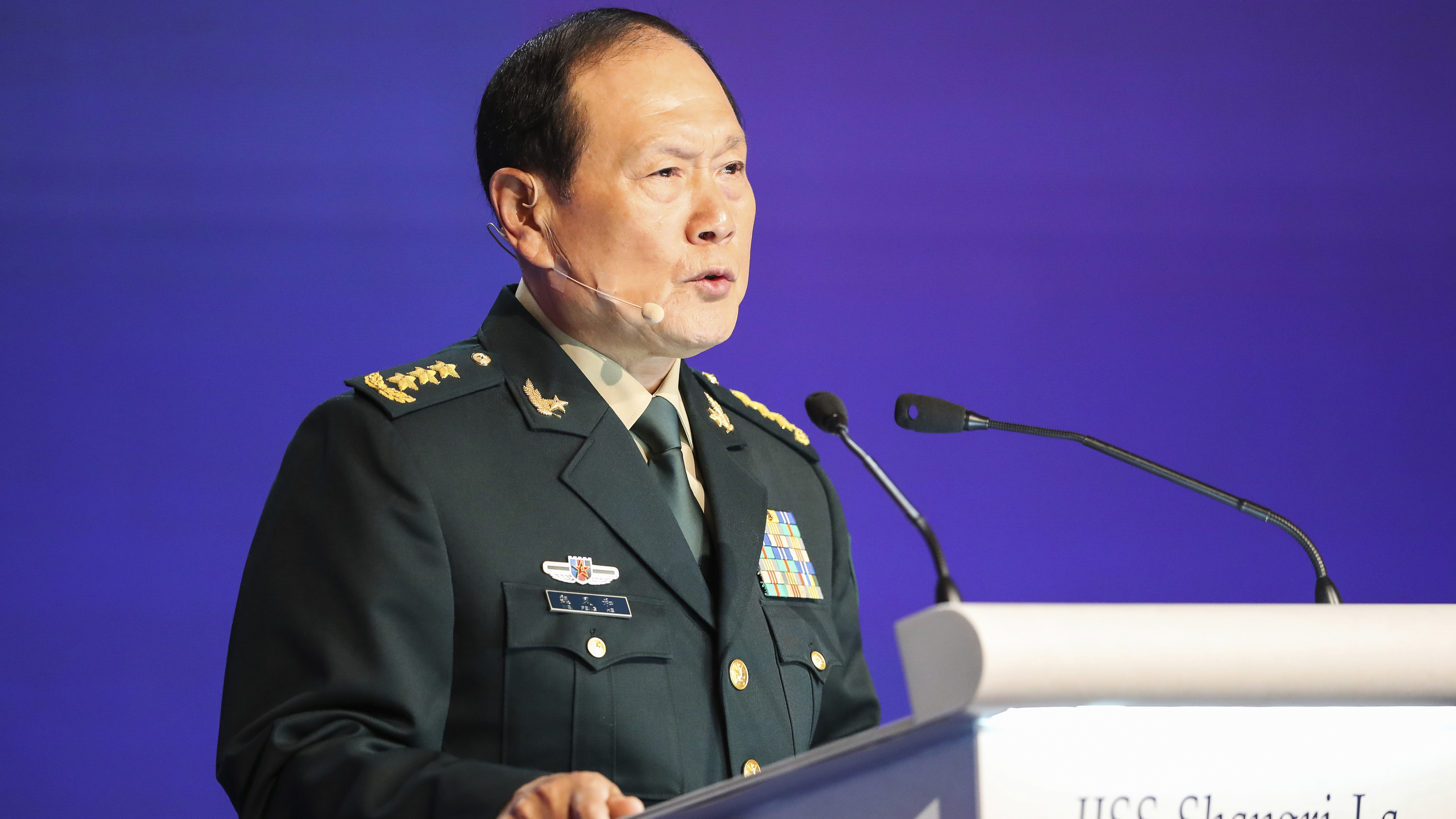 China's Defense Minister General Wei Fenghe speaks at a plenary session during the 19th International Institute for Strategic Studies (IISS) Shangri-la Dialogue, Asia's annual defense and security forum, in Singapore.