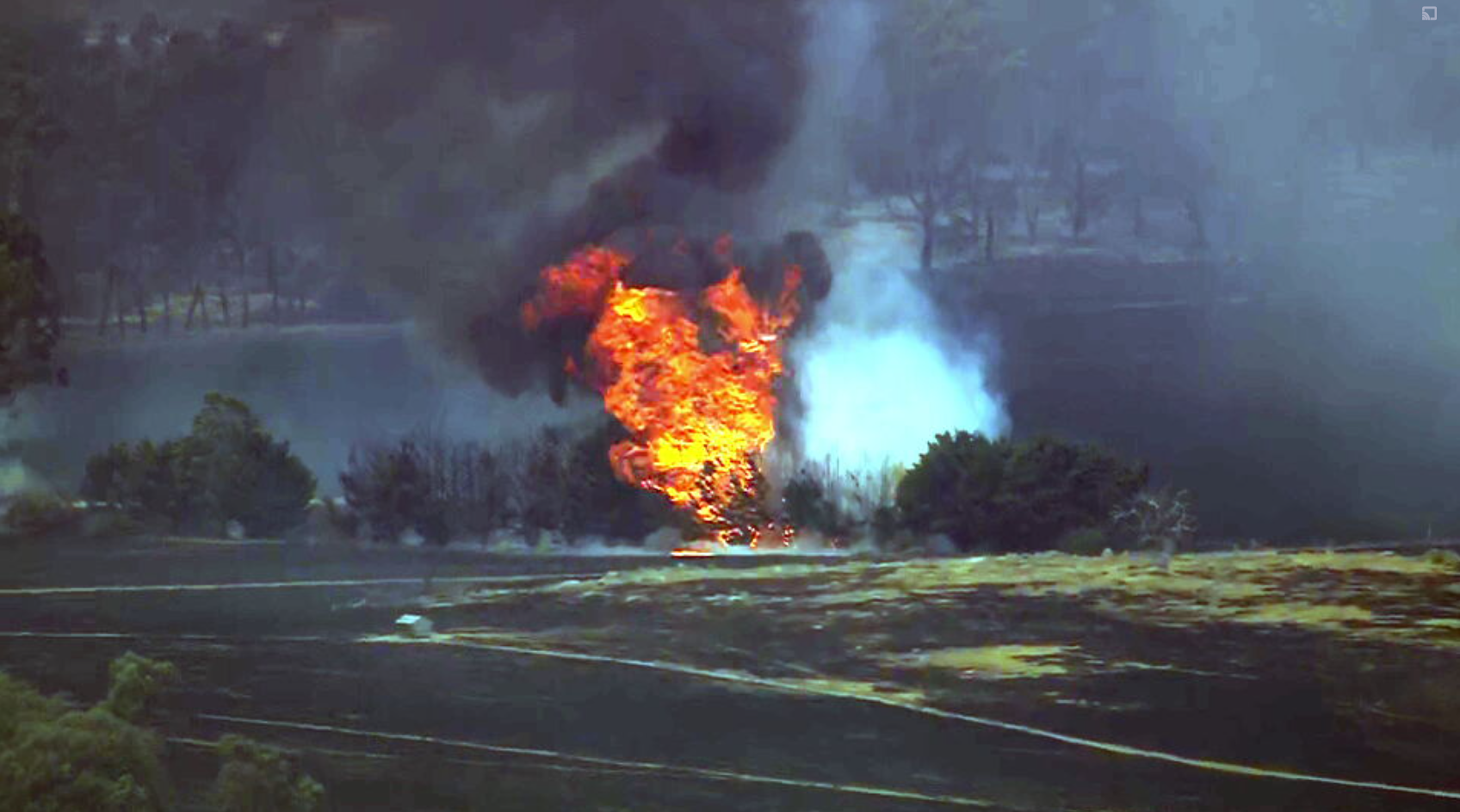 Strong south-westerly winds are ﻿fanning flames north of Melbourne, sparking evacuation warnings for more than two dozen towns.