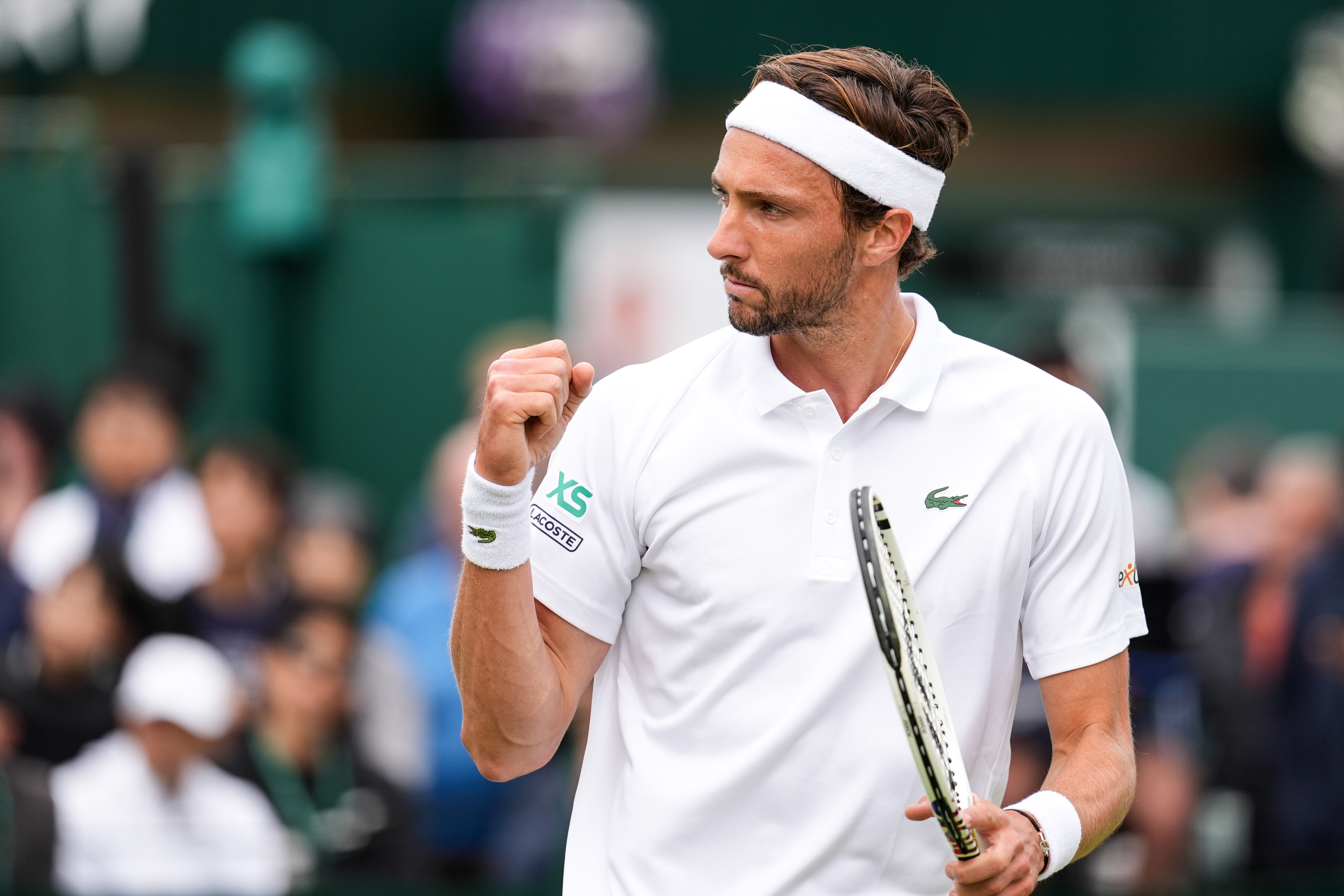 Arthur Rinderknech of France reacts in the Men's Singles Second Round match against Kei Nishikori of Japan during day three of The Championships Wimbledon 2024 at All England Lawn Tennis and Croquet Club on July 03, 2024 in London, England. (Photo by Shi Tang/Getty Images)