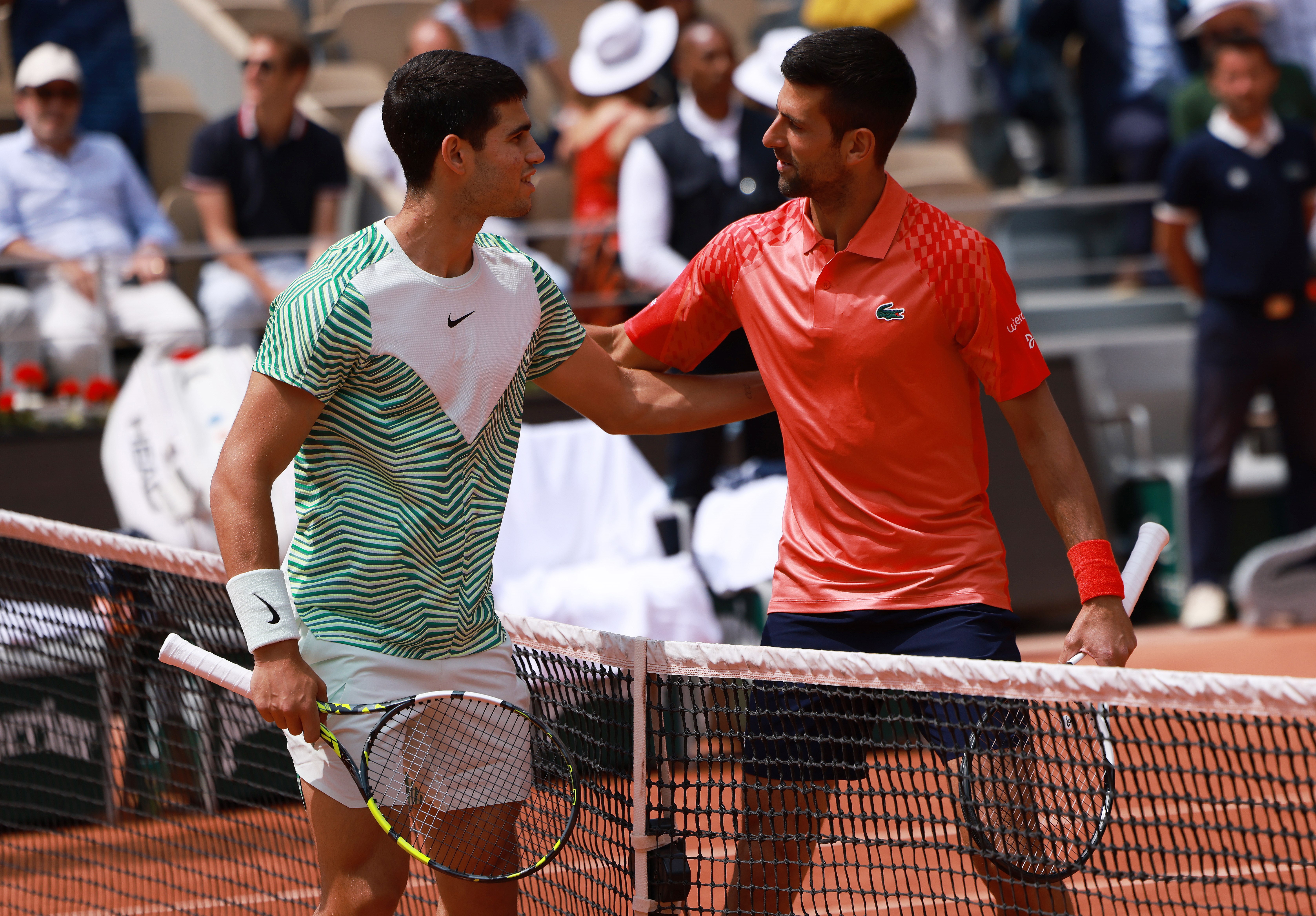 Novak Djokovic R of Serbia greets Carlos Alcaraz of Spain prior to the men's singles semifinals between Novak Djokovic of Serbia and Carlos Alcaraz of Spain at the French Open tennis tournament at Roland Garros in Paris, France, June 9, 2023. (Photo by Gao Jing/Xinhua via Getty Images)