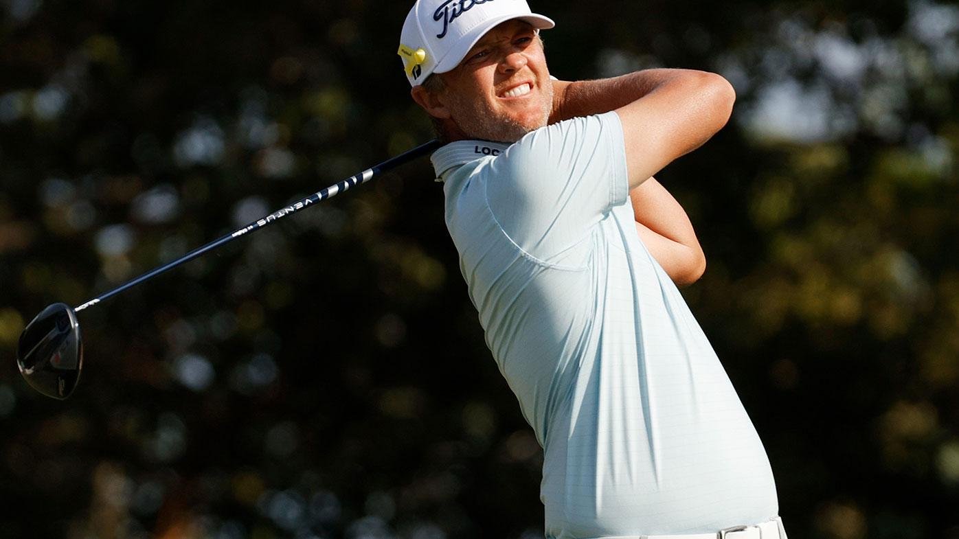 Matt Jones of Australia plays his shot from the 14th tee during the final round of The Honda Classic.