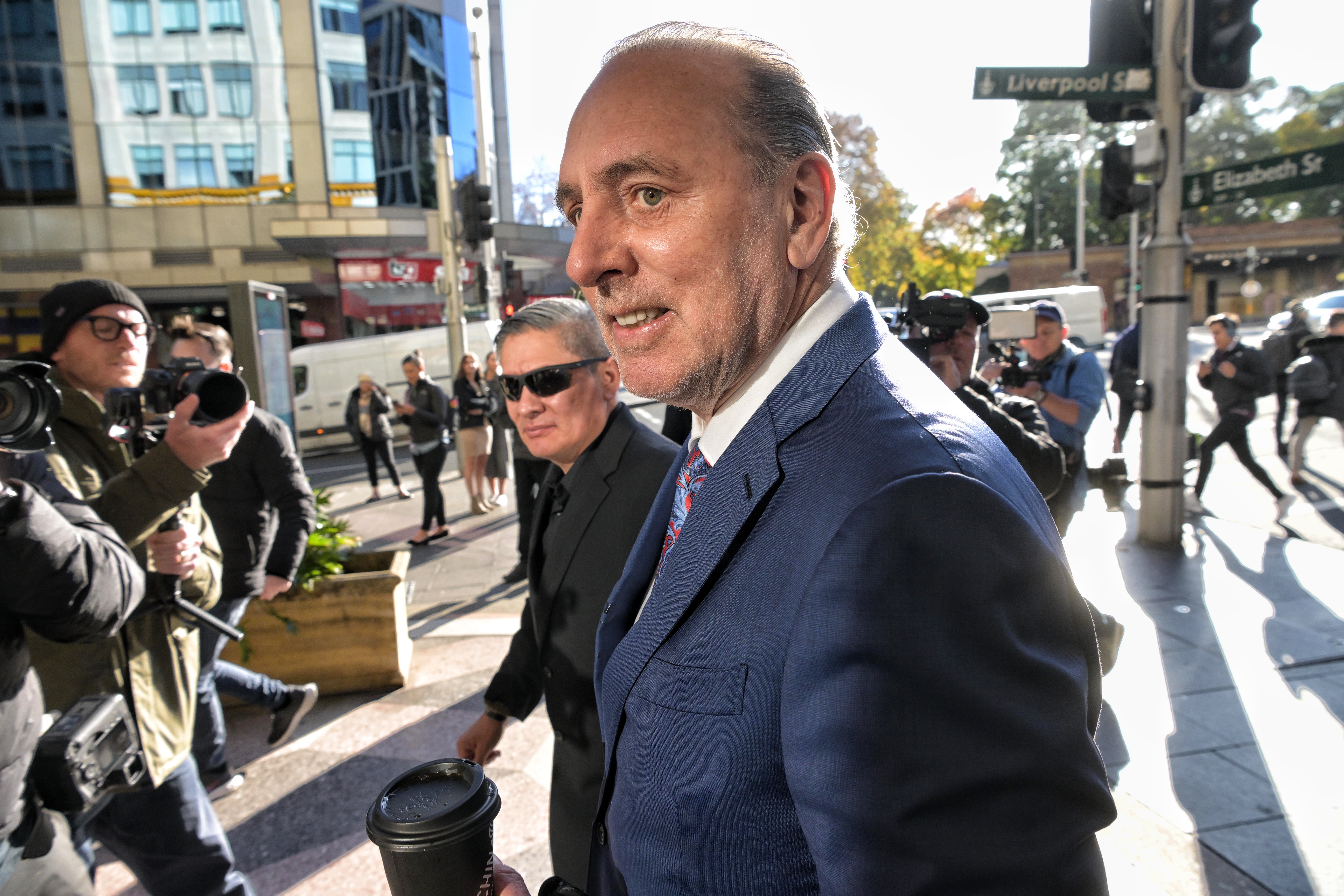 Brian Houston enters Downing Centre courts Photo Nick Moir 15 June 2023