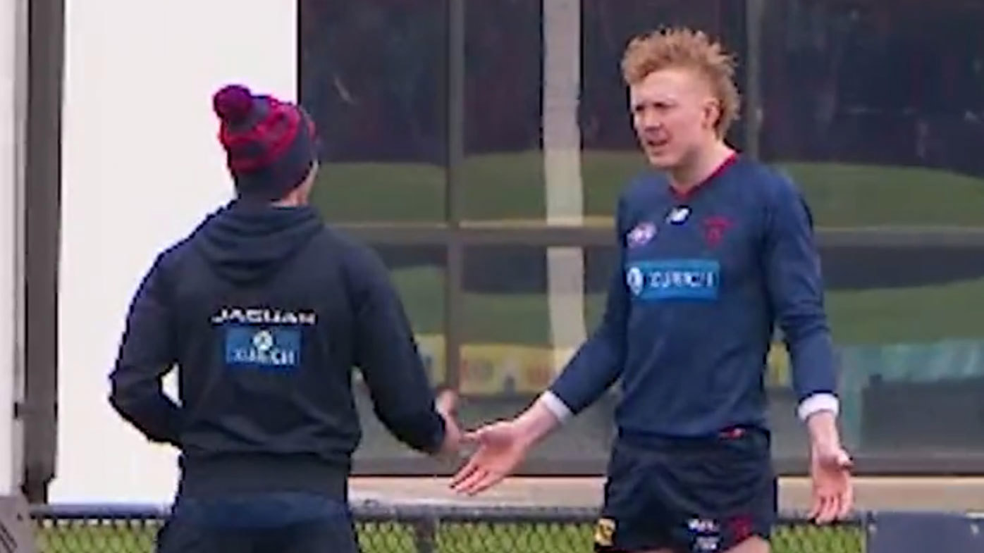 Melbourne star Clayton Oliver was pictured having a heated discussion with one of the club's staffers at training on Wednesday
