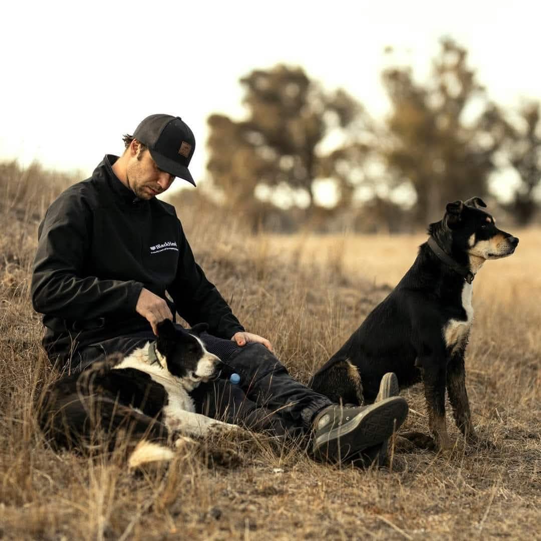 Brady Morris with two BackTrack dogs.
