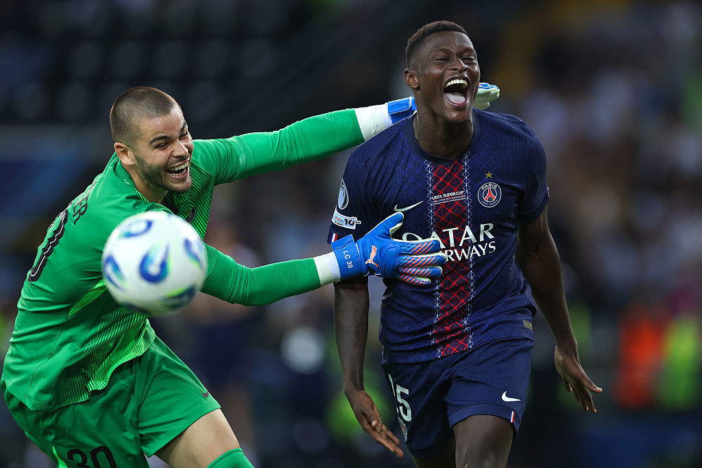 Nuno Mendes of Paris Saint Germain celebrates scoring the winning penalty.