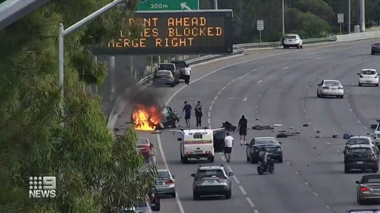 Perth freeway crash 'like something out of the movies' causes peak hour chaos