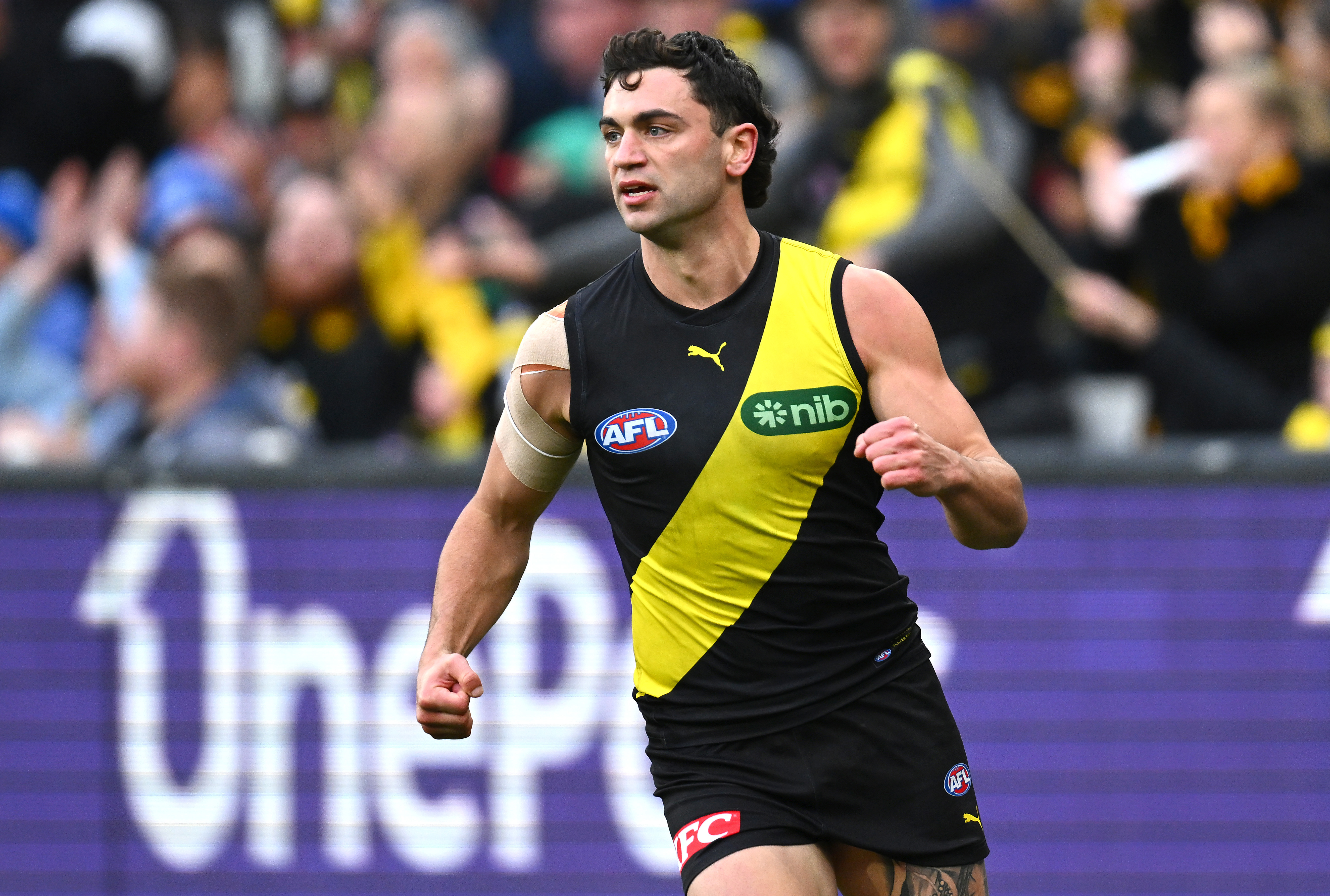 MELBOURNE, AUSTRALIA - MAY 06: Tim Taranto of the Tigers celebrates kicking a goal during the round eight AFL match between Richmond Tigers and West Coast Eagles at Melbourne Cricket Ground, on May 06, 2023, in Melbourne, Australia. (Photo by Quinn Rooney/Getty Images)