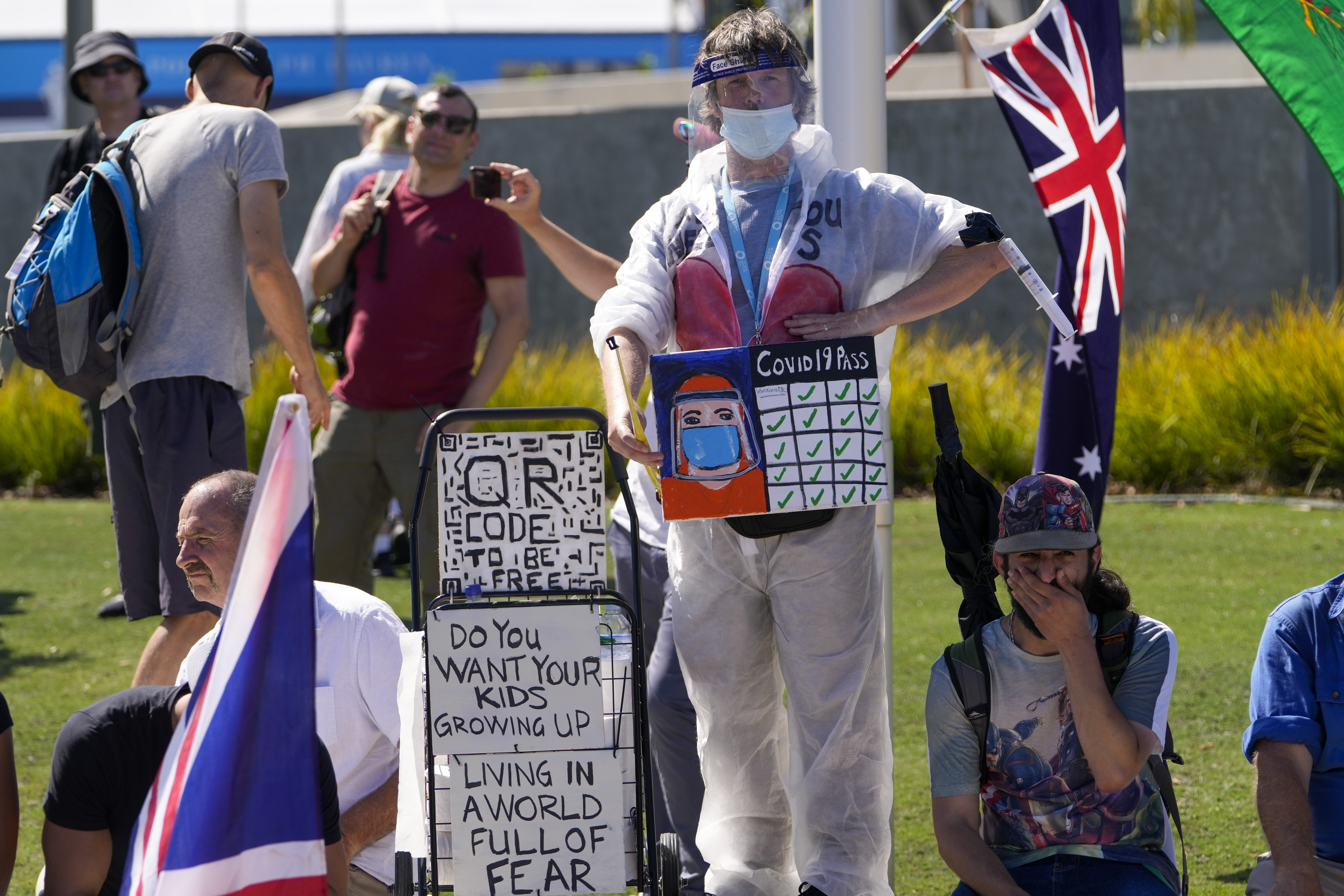 Protesters marched in Melbourne to also demand  COVID-19 mandates be stopped. 