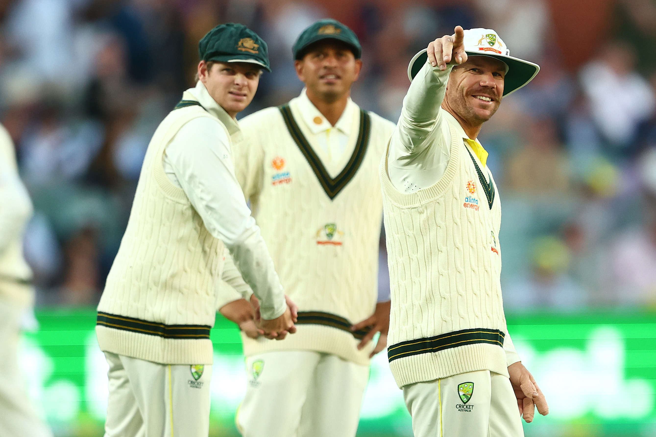 ADELAIDE, AUSTRALIA - DECEMBER 09:  David Warner, Steve Smith and Usman Khawaja of Australia look on during day two of the Second Test Match in the series between Australia and the West Indies at Adelaide Oval on December 09, 2022 in Adelaide, Australia. (Photo by Chris Hyde/Getty Images)