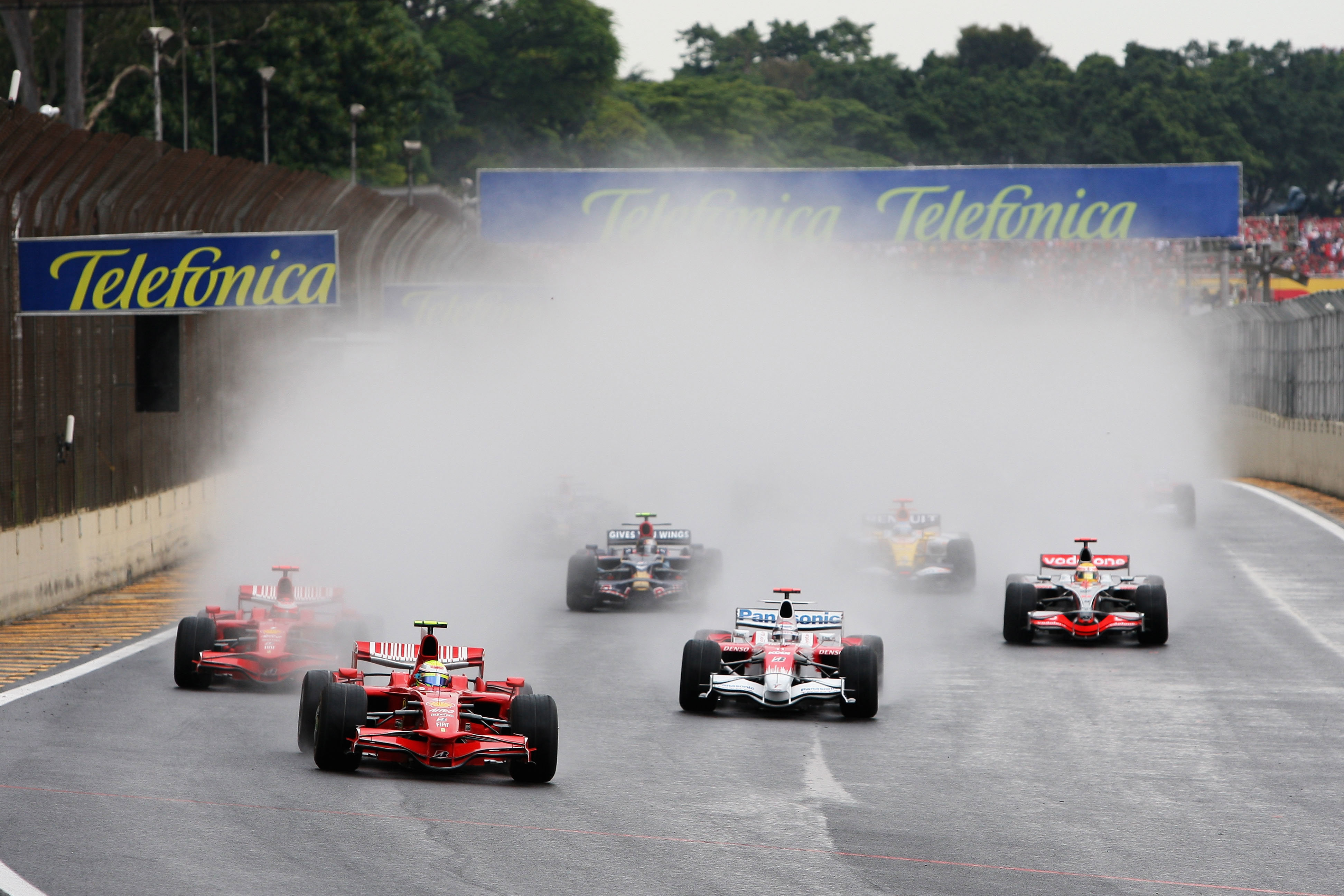 Felipe Massa leads the field into turn one during the season-ending 2008 Brazilian Grand Prix.