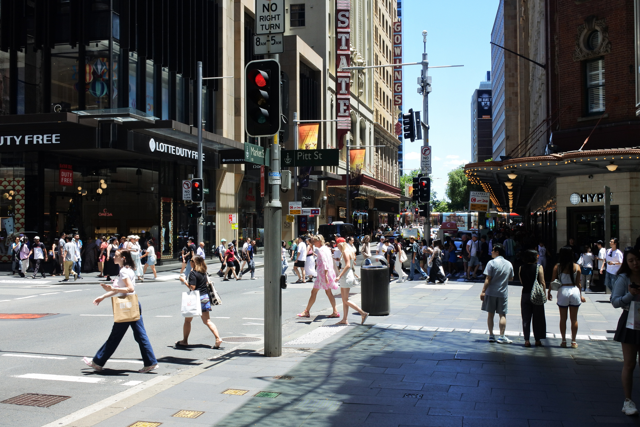 SYDNEY - DEC 29 2024:Pedestrians crossing a street in Sydney central business district in Sydney the capital city of New South Wales, Australia.