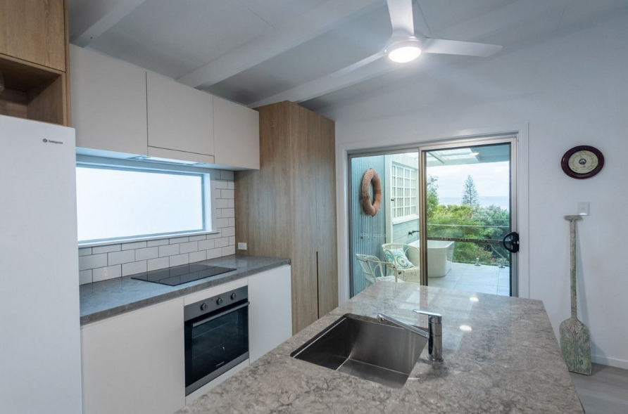 Homes on the market with bath tubs on the balconies.