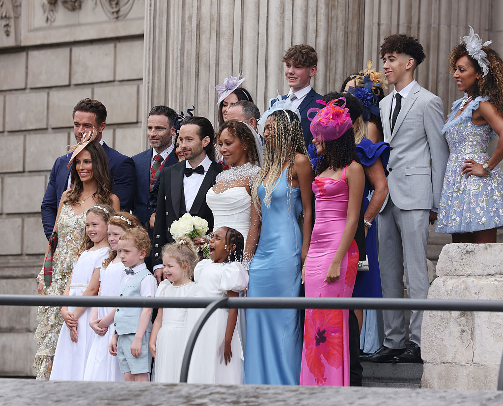 LONDON, ENGLAND - JULY 05: Mel B and Rory McPhee pose on the steps at St Paul's Cathedral with bridesmaids and their family on July 05, 2025 in London, England. (Photo by Neil Mockford/GC Images)