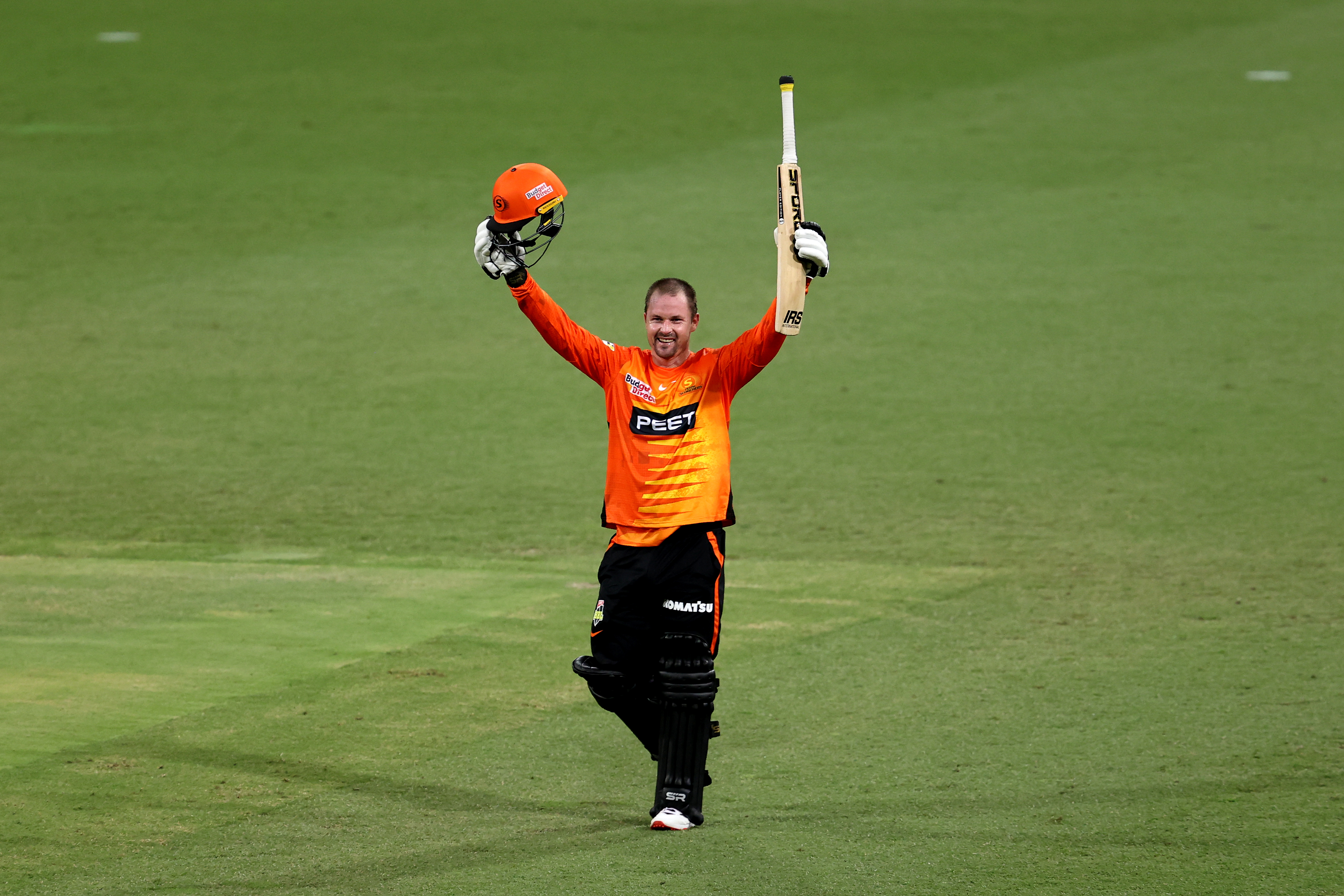 The Scorchers' Colin Munro celebrates scoring his maiden BBL century.