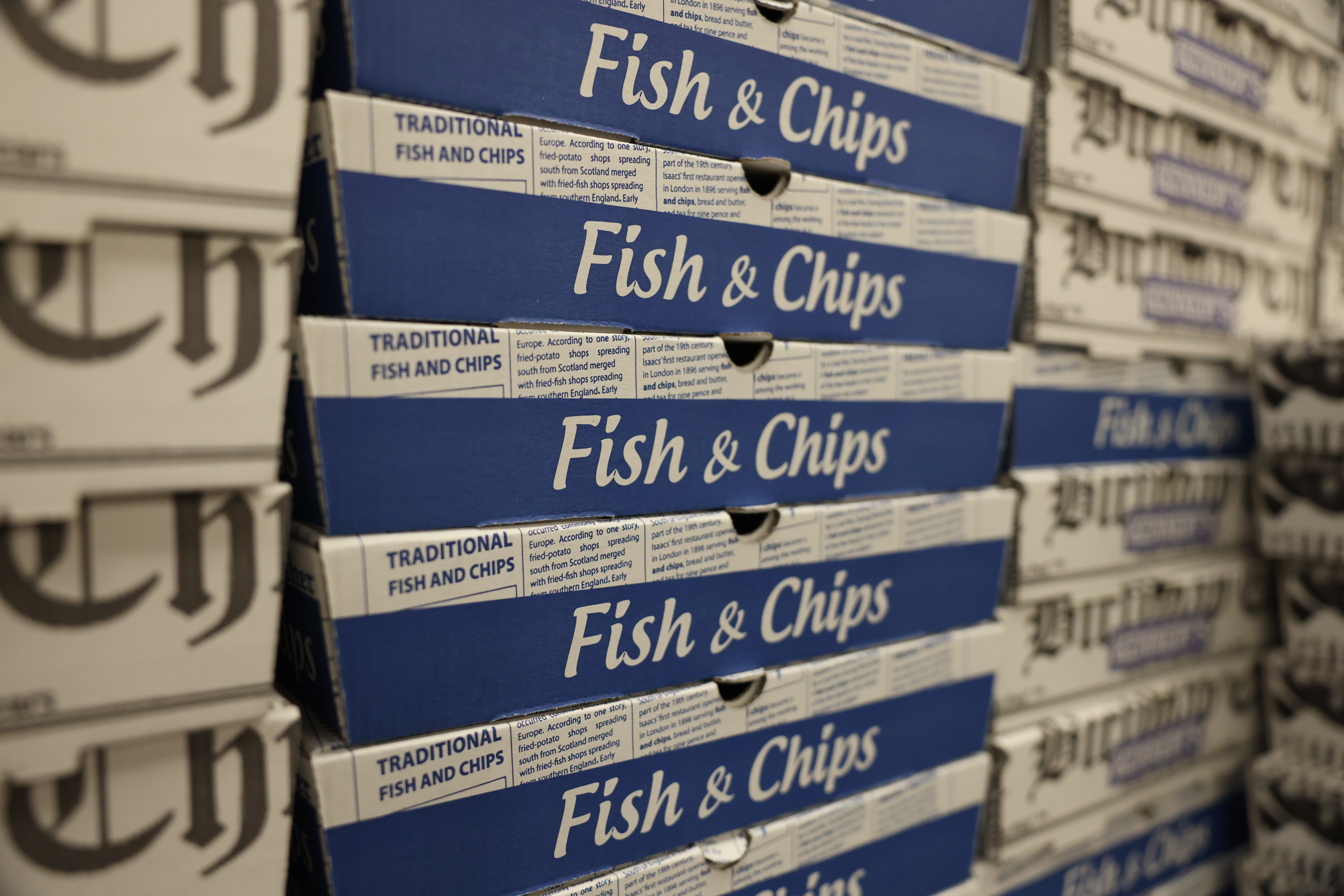 Fish and chips boxes at a shop on May 1, 2022 in London, England. The war in Ukraine is causing a shortage of sunflower oil. (Photo by Hollie Adams/Getty Images)