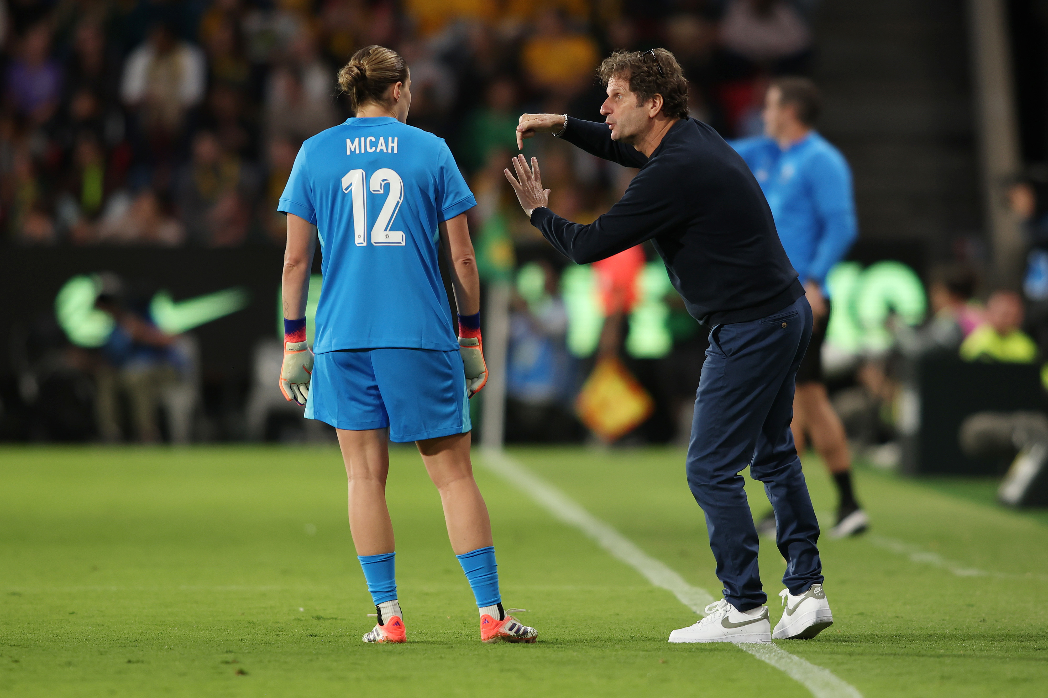 Joe Montemurro gives instructions to goalkeeper Teagan Micah.