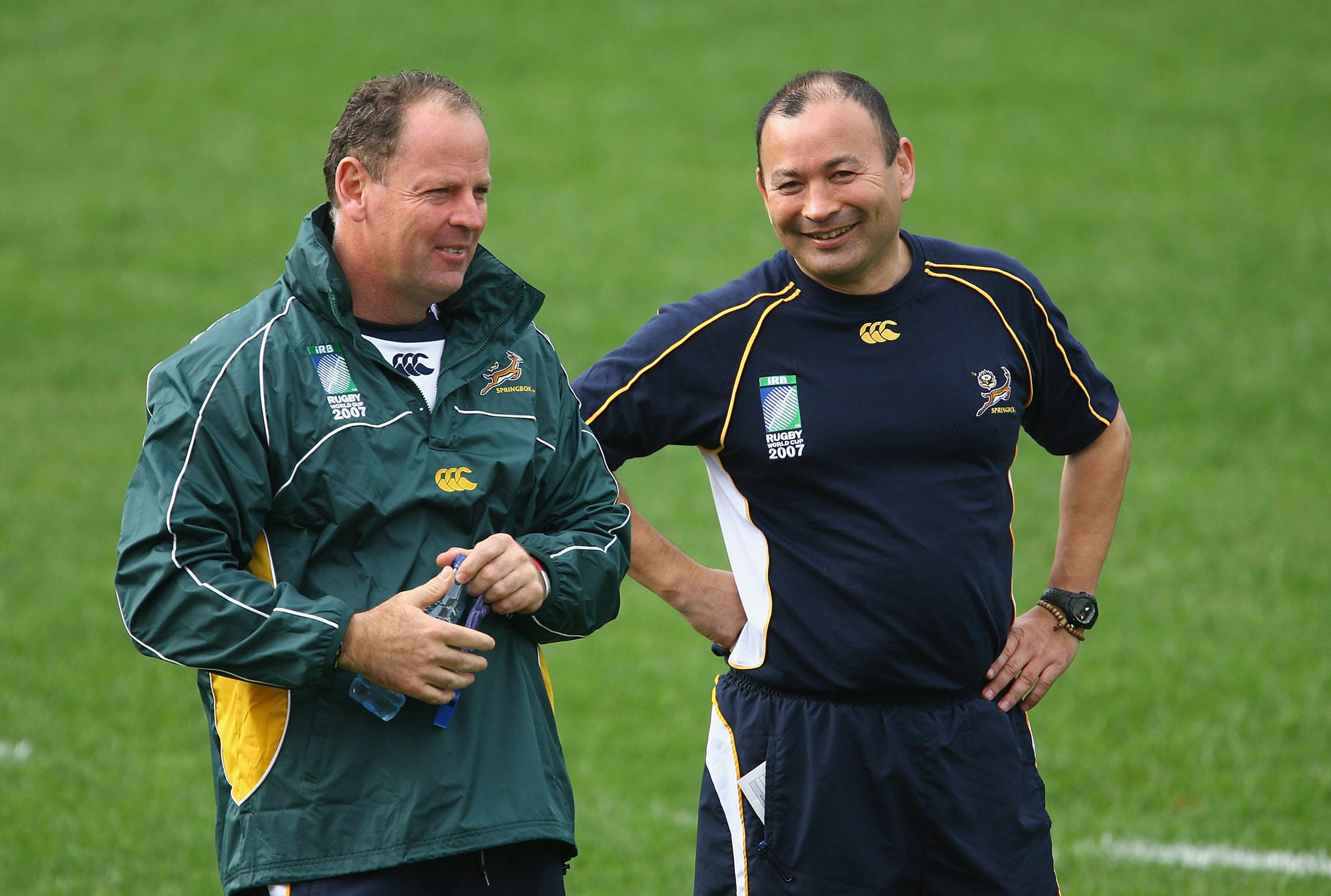 Jake White and Eddie Jones talk during a South Africa training session in Marseille.