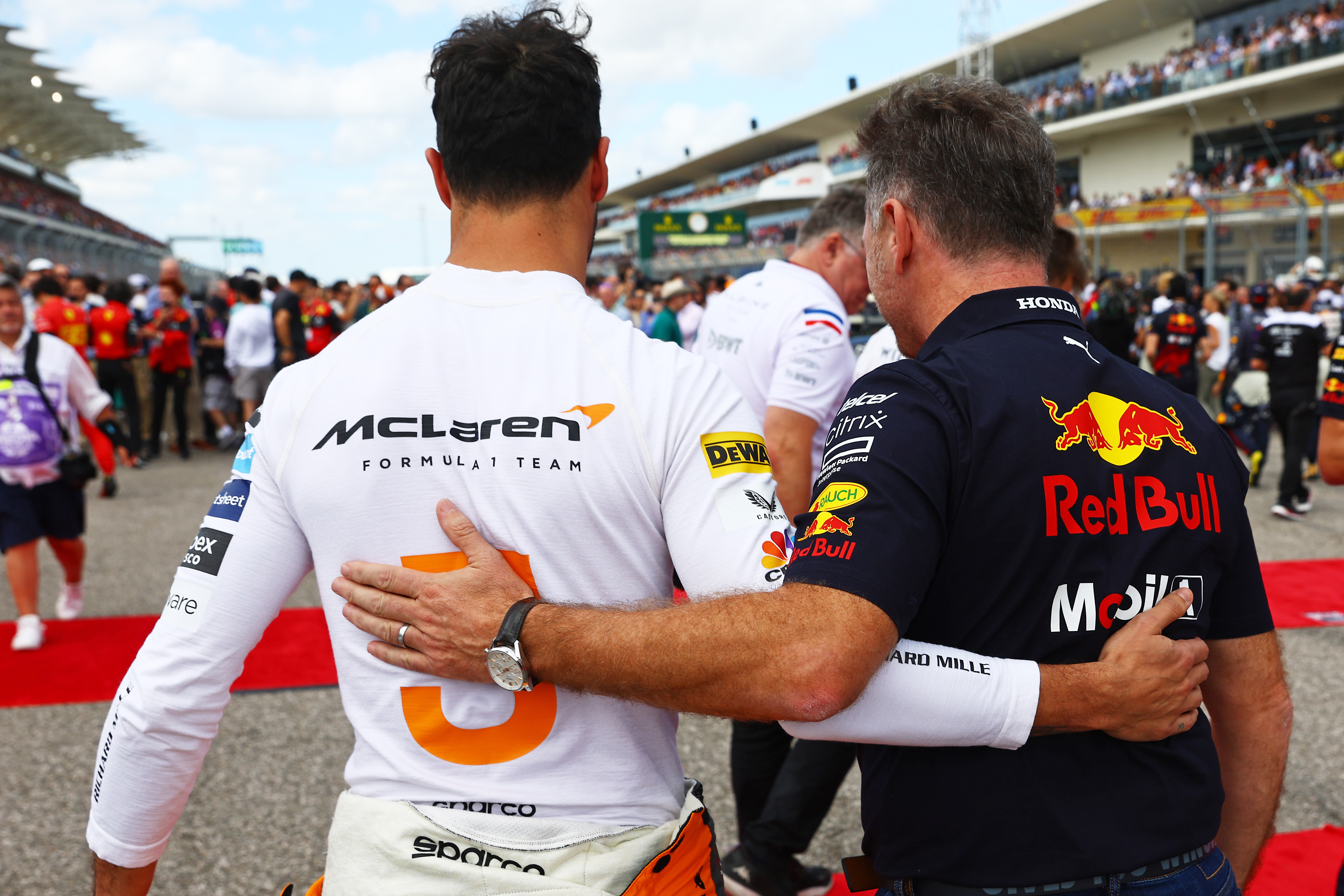 Red Bull team principal Christian Horner embraces Daniel Ricciardo.