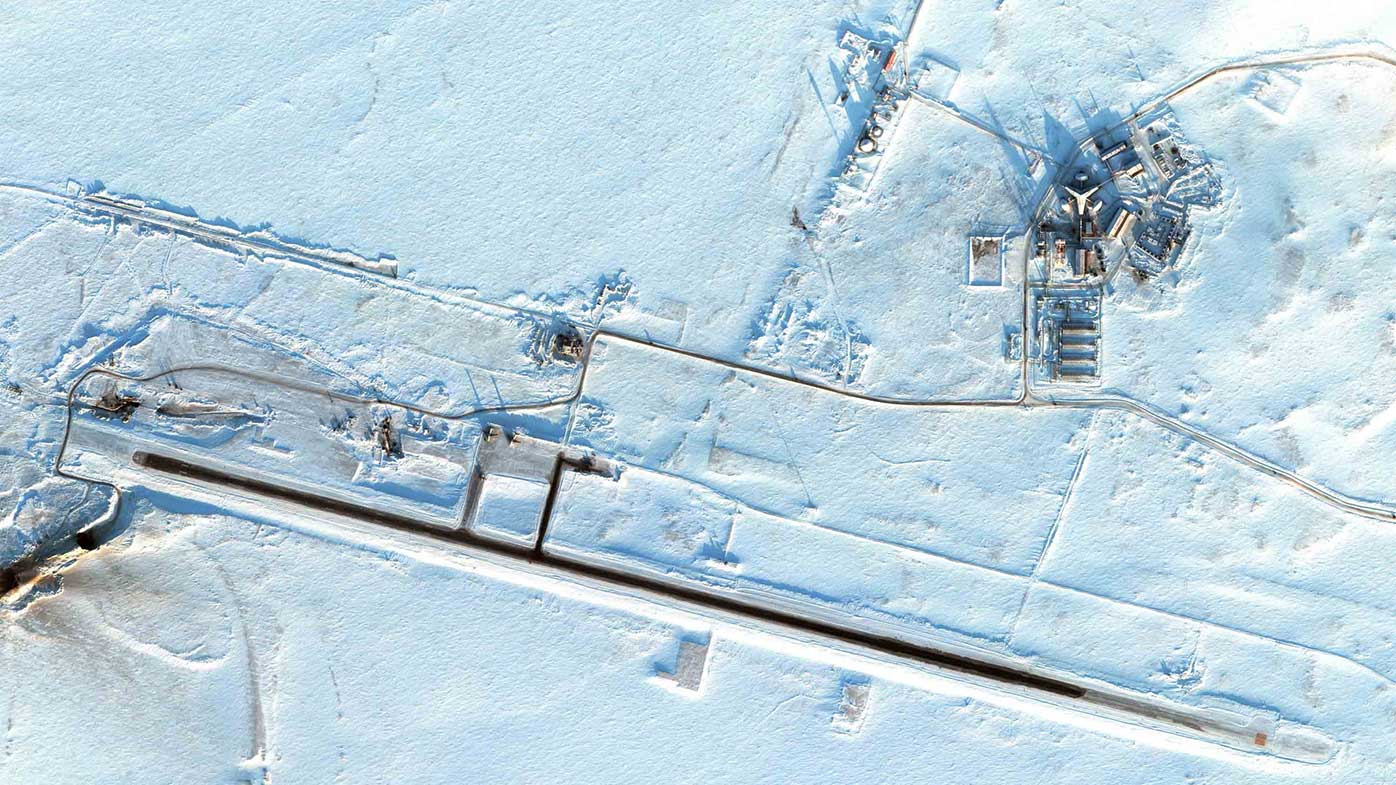 Russia's northernmost military facility, the airfield in Nagurskoye is one of several "trefoil" bases, featuring a three-ponged building painted in the colors of the Russian flag. Nagurskoye is seen here on March 16.