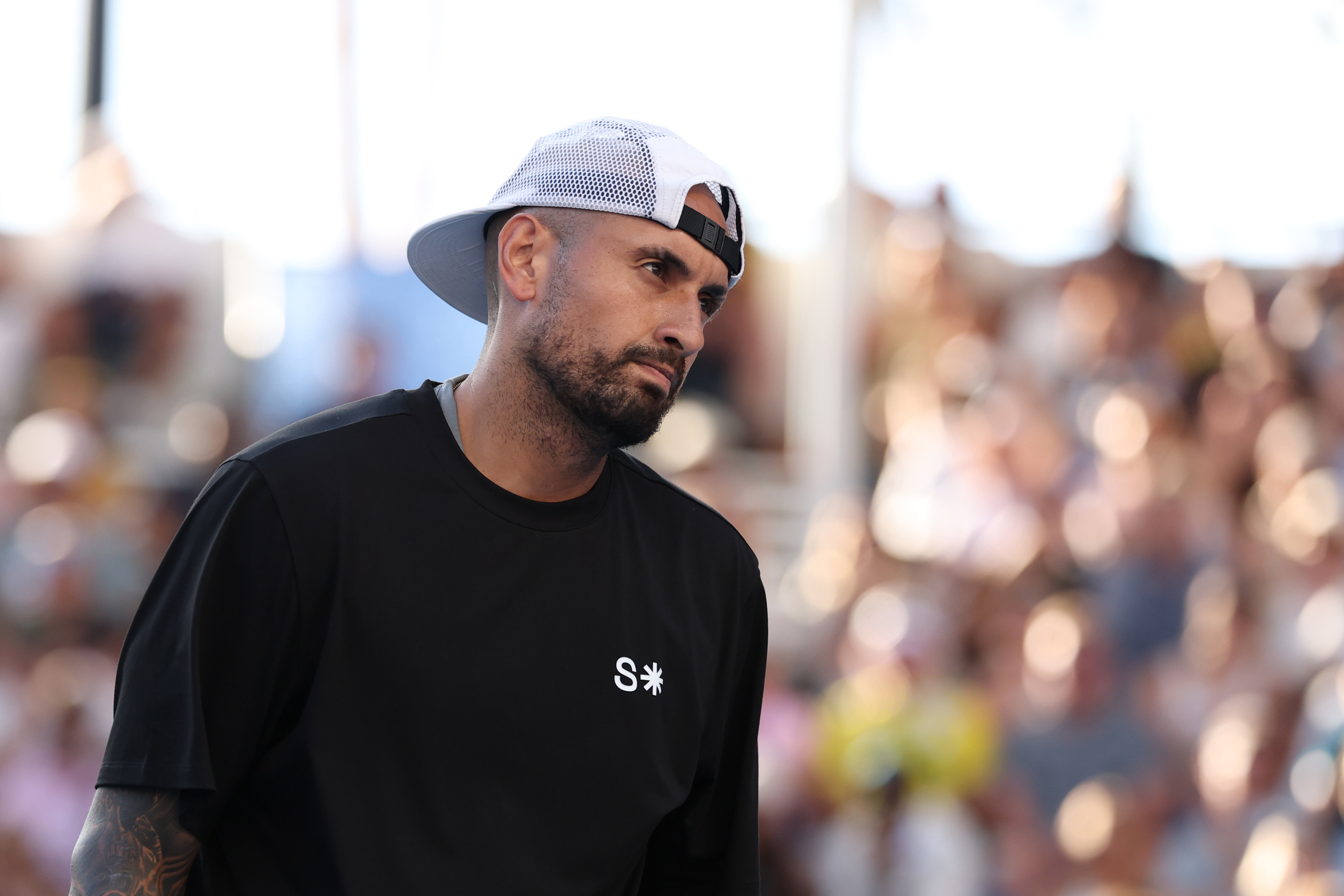 Nick Kyrgios  in action alongside Canada's Leylah Fernandez during their mixed doubles debut.