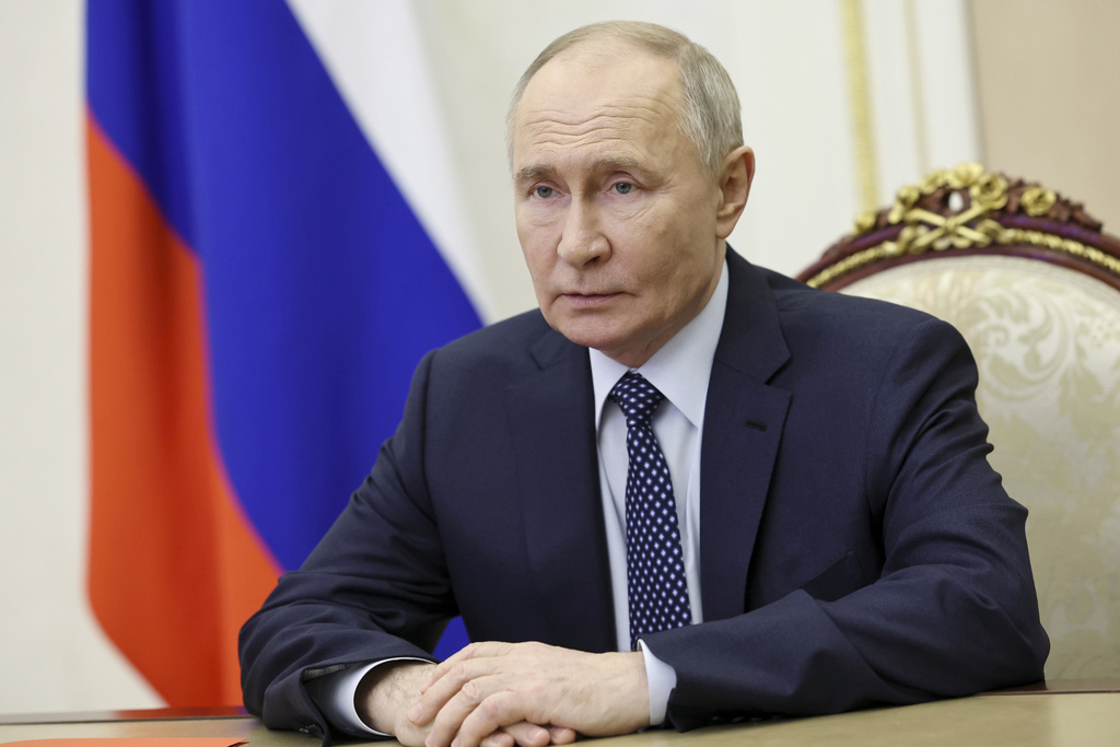 Russian President Vladimir Putin chairs a Security Council meeting via videoconference at the Kremlin in Moscow, Russia, Saturday, Dec. 28, 2024. (Sergei Ilyin, Sputnik, Kremlin Pool Photo via AP)