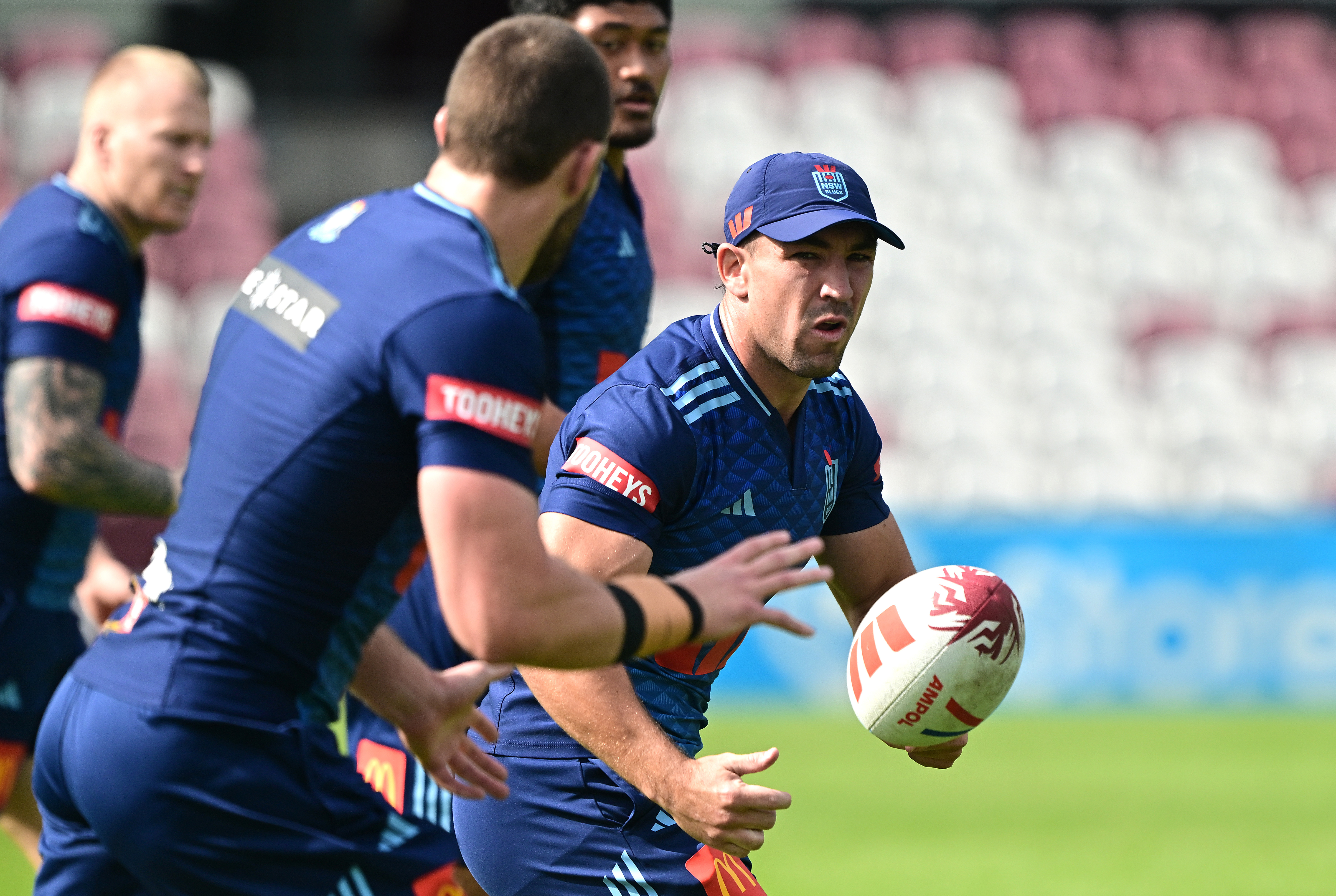 BRISBANE, AUSTRALIA - MAY 26: Reece Robson passes the ball during the NSW Blues State of Origin Squad training session at Ballymore Stadium on May 26, 2025 in Brisbane, Australia. (Photo by Bradley Kanaris/Getty Images)