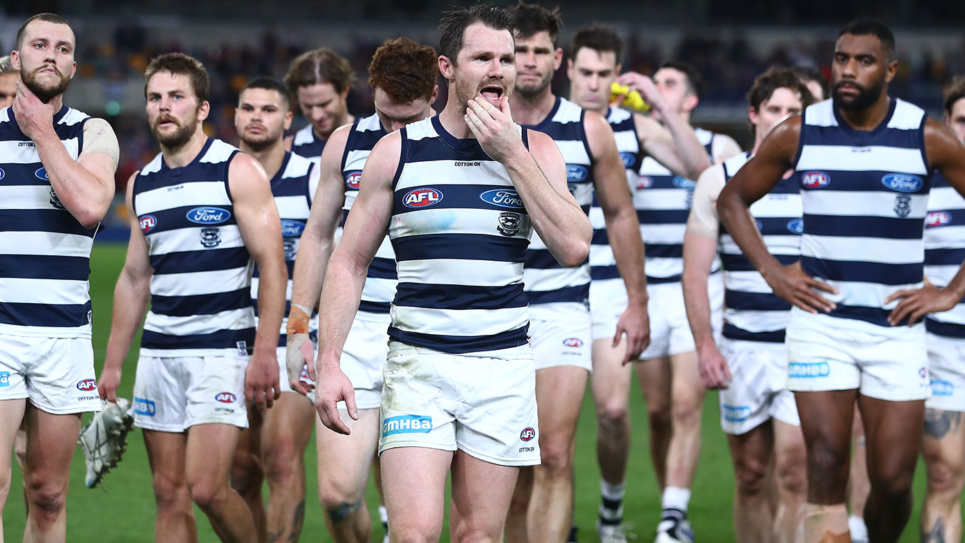 Patrick Dangerfield and the Cats leave the field after losing the round 14 AFL match between the Brisbane Lions and the Geelong Cats at The Gabba on June 24, 2021 in Brisbane, Australia. (Photo by Chris Hyde/AFL Photos/via Getty Images)