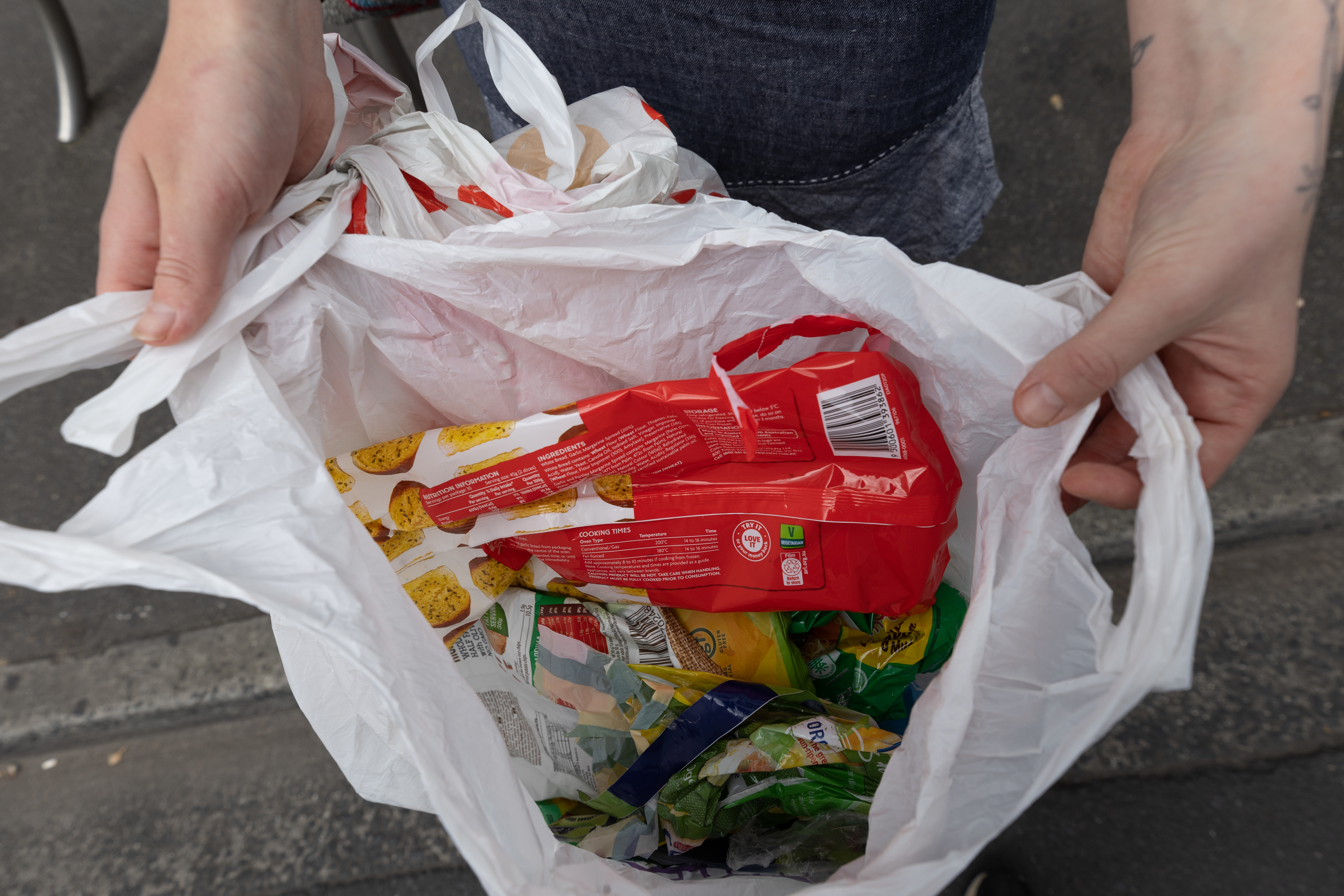 RedCycle have been unsafely storing plastic bags in warehouses rather than distributing them for reuse, creating a fire risk, and discouraging recycling. Lucinda Moje, Footscray student, recycler. Photo by Jason South. 8th November 2022