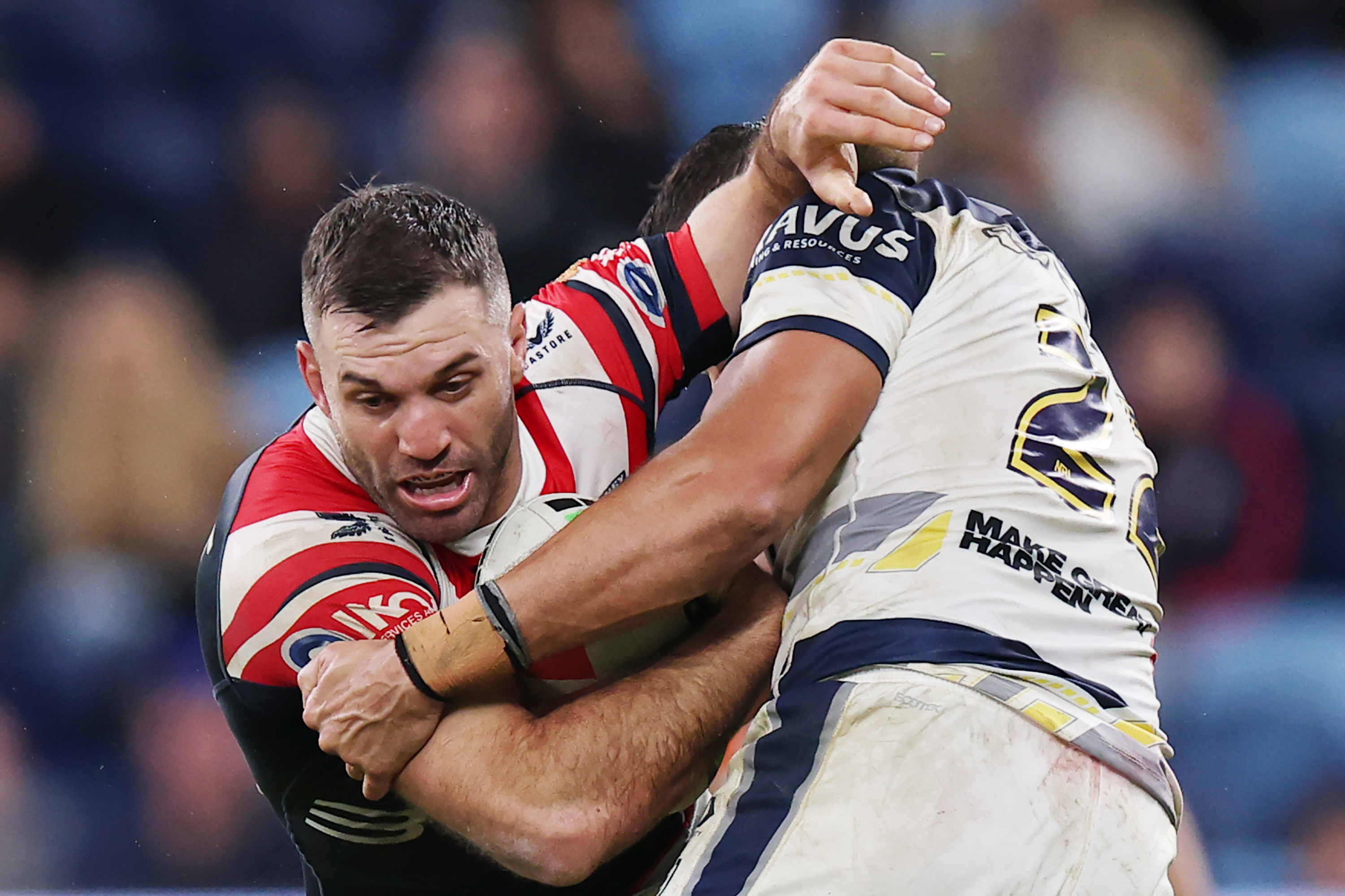 SYDNEY, AUSTRALIA - JUNE 22: James Tedesco of the Roosters is tackled during the round 16 NRL match between Sydney Roosters and North Queensland Cowboys at Allianz Stadium, on June 22, 2025, in Sydney, Australia. (Photo by Jeremy Ng/Getty Images)