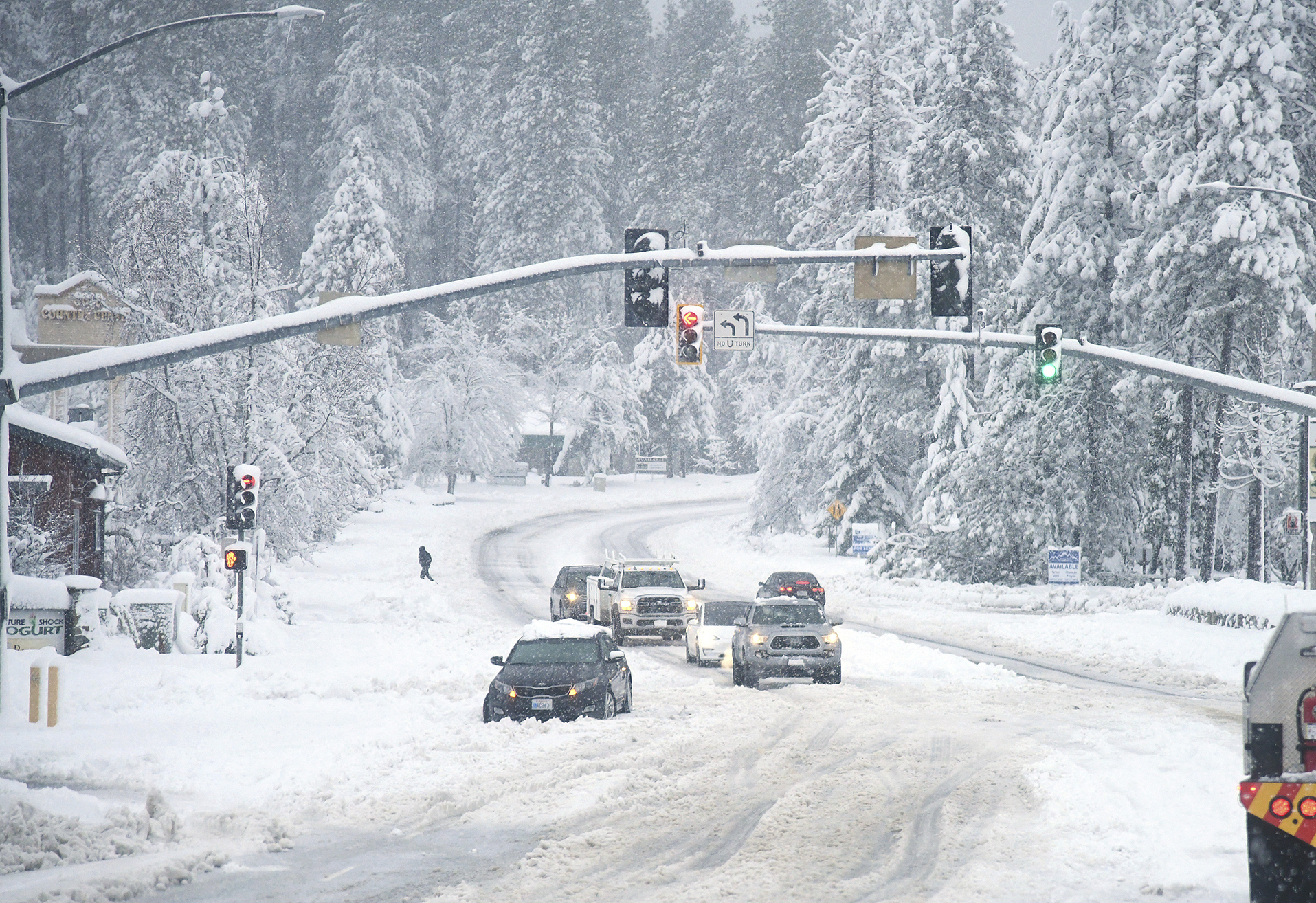 The snow was so thick that a vehicle got stuck in it in Grass Valley in California. 