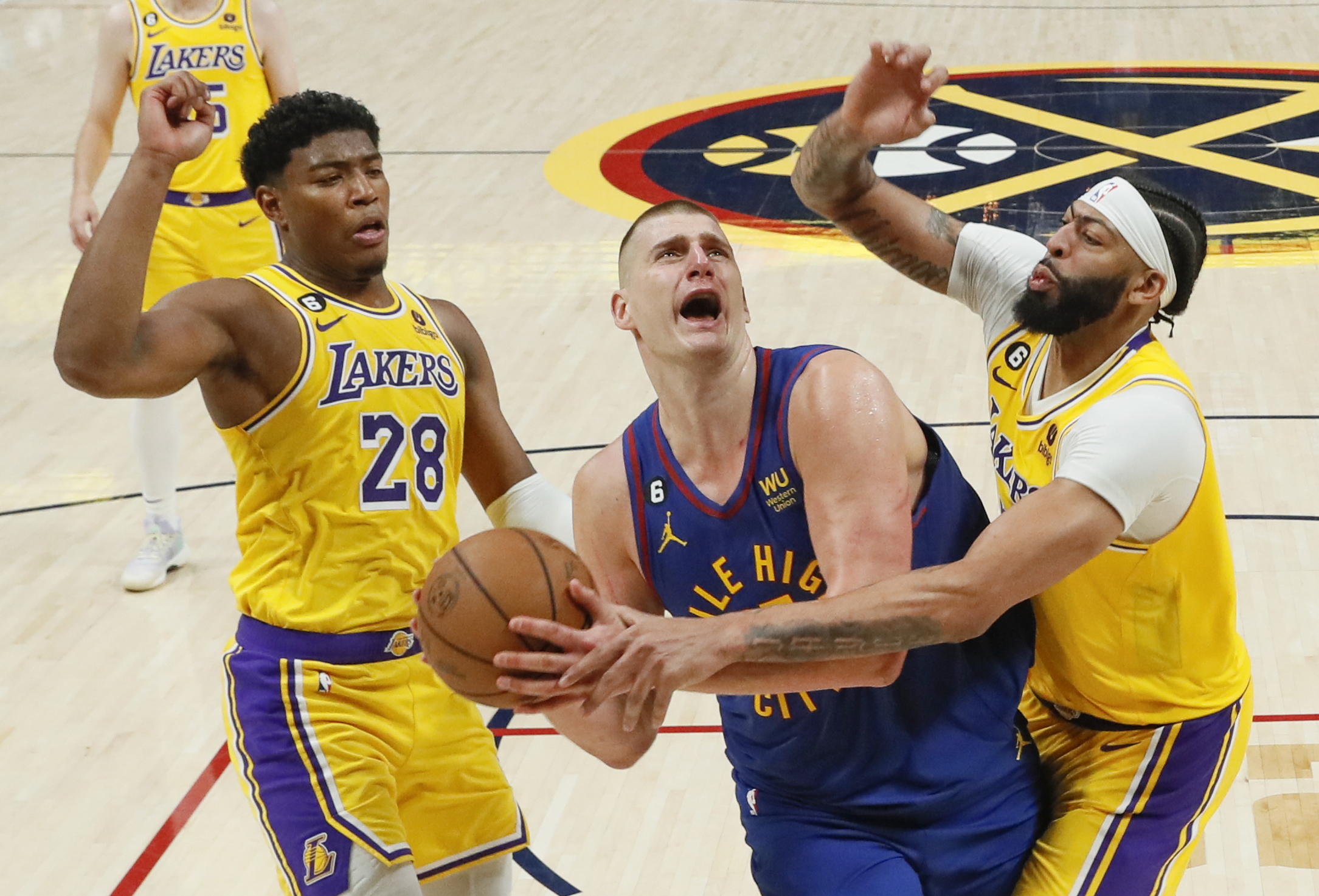 Nikola Jokic leads Nuggets past Lakers 132-126 in West opener