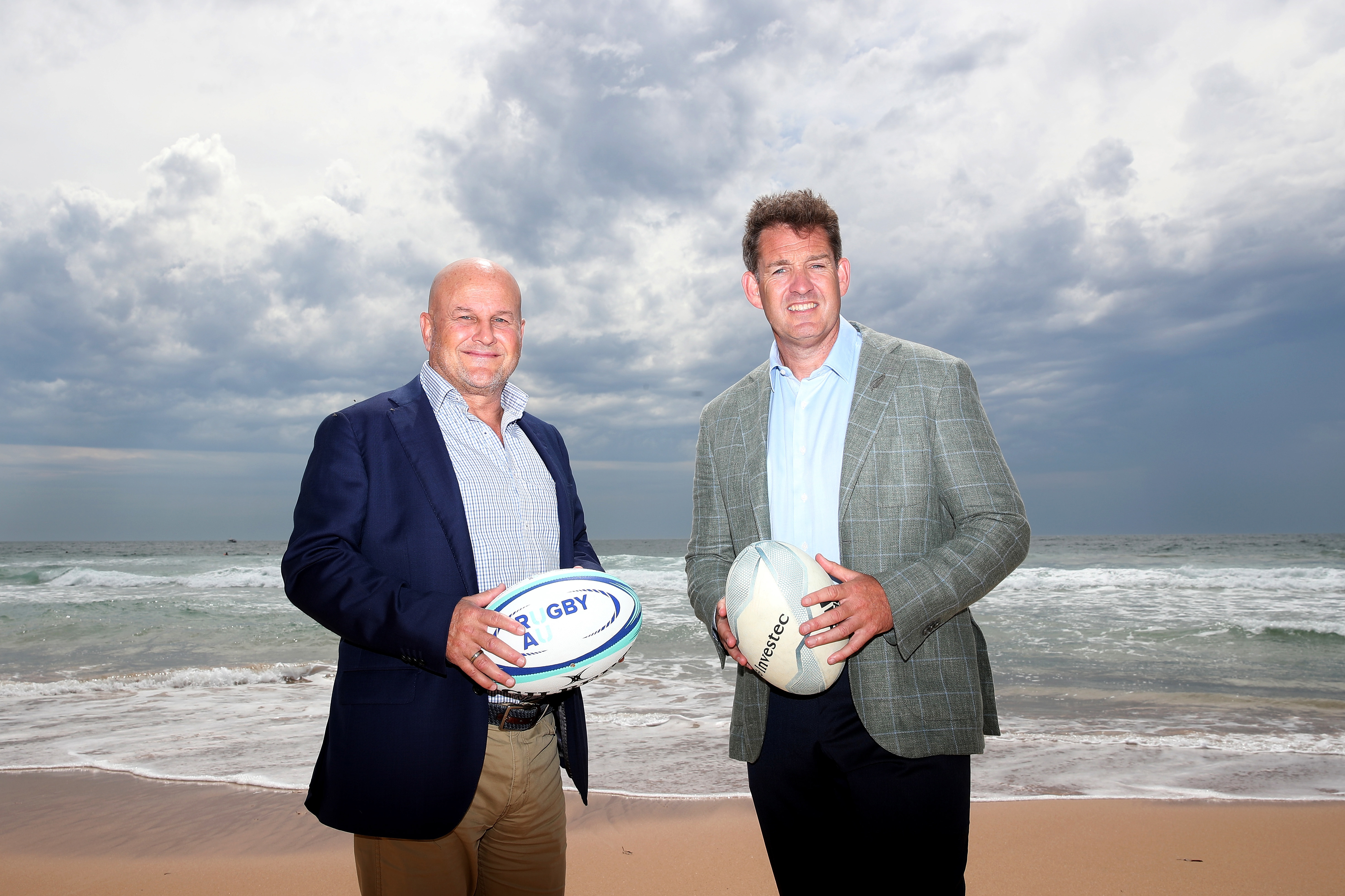 Rugby Australia's interim chief executive Rob Clarke and NZ Rugby chief executive Mark Robinson at Manly Beach in 2020.
