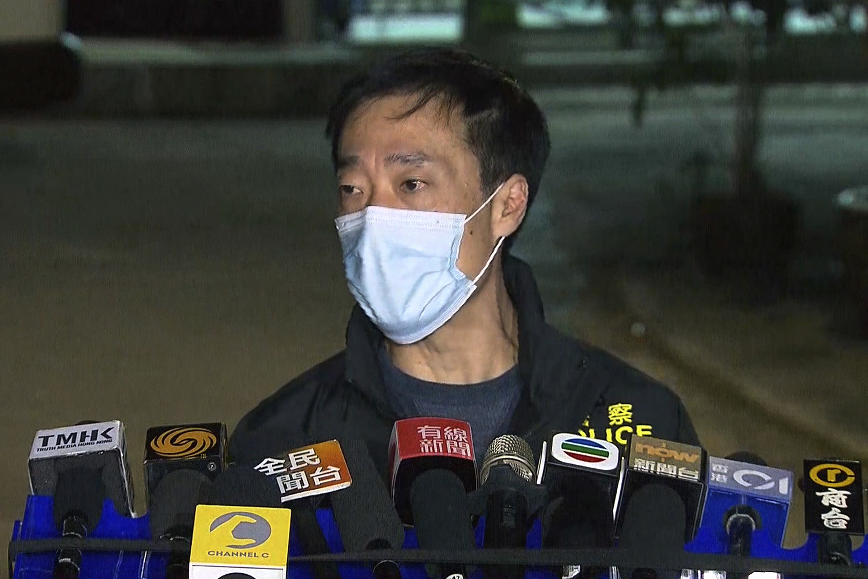 In this image taken from video footage provided by TVB Hong Kong, Police Superintendent Alan Chung speaks to the media following a murder case of a model, in Hong Kong on Sunday, Feb. 26, 2023. Police in Hong Kong filed murder charges against the former in-laws of a model and influencer whose body parts were found in a refrigerator at a village house, and a skull believed to be hers was discovered in a pot. (TVB Hong Kong via AP)
