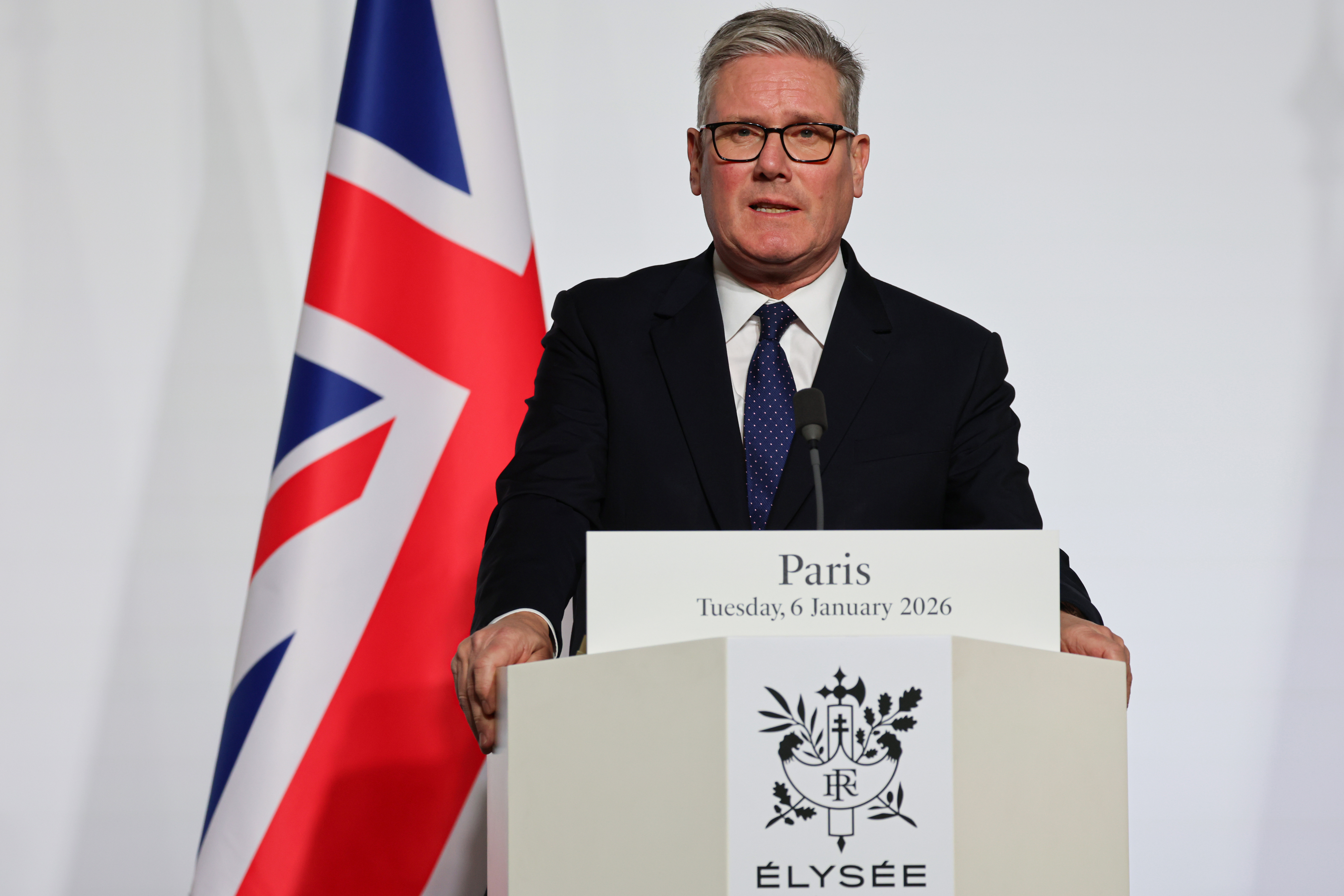 Britain's Prime Minister Keir Starmer delivers a speech upon the signing of the declaration on deploying post-ceasefire force in Ukraine during the 'Coalition of the Willing' summit on security guarantees for Ukraine, at the Elysee Palace in Paris Tuesday, Jan 6, 2026. (Ludovic Marin, Pool photo via AP)