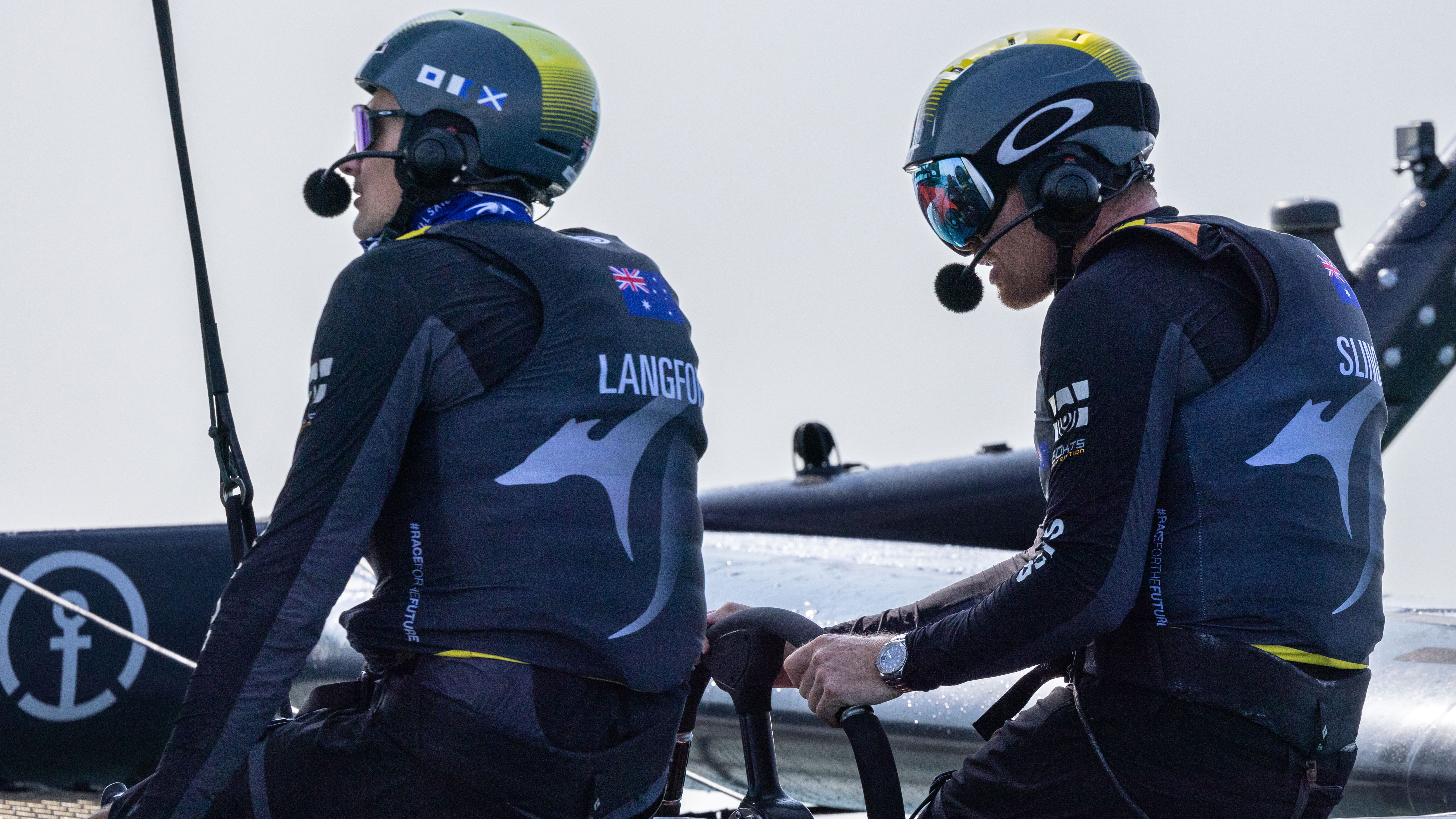 Tom Slingsby, driver of Australia's SailGP team, at the wheel during a practice session ahead of the Dubai Grand Prix.