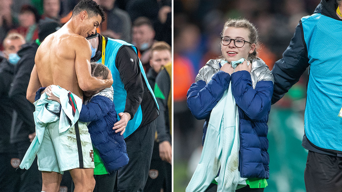 Ronaldo gifts his jersey to a young fan