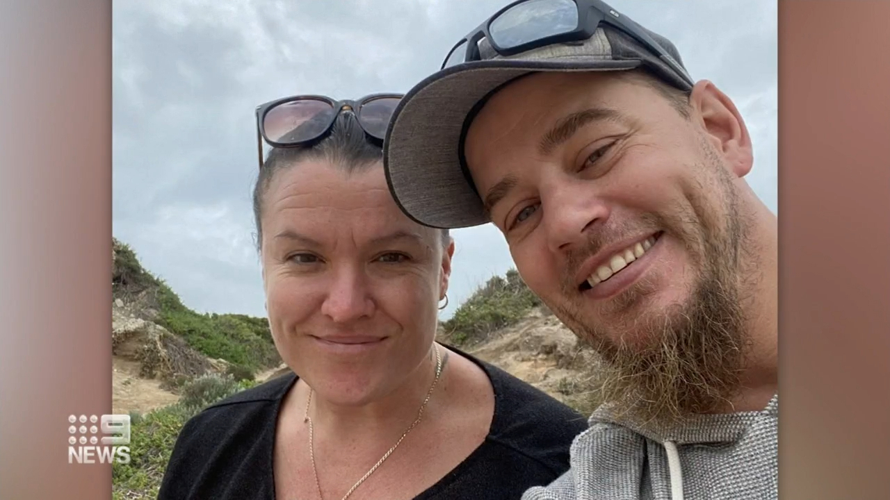 His partner Peta Byrne leapt into action, fought to pull him from the water before two strangers waded out to help.