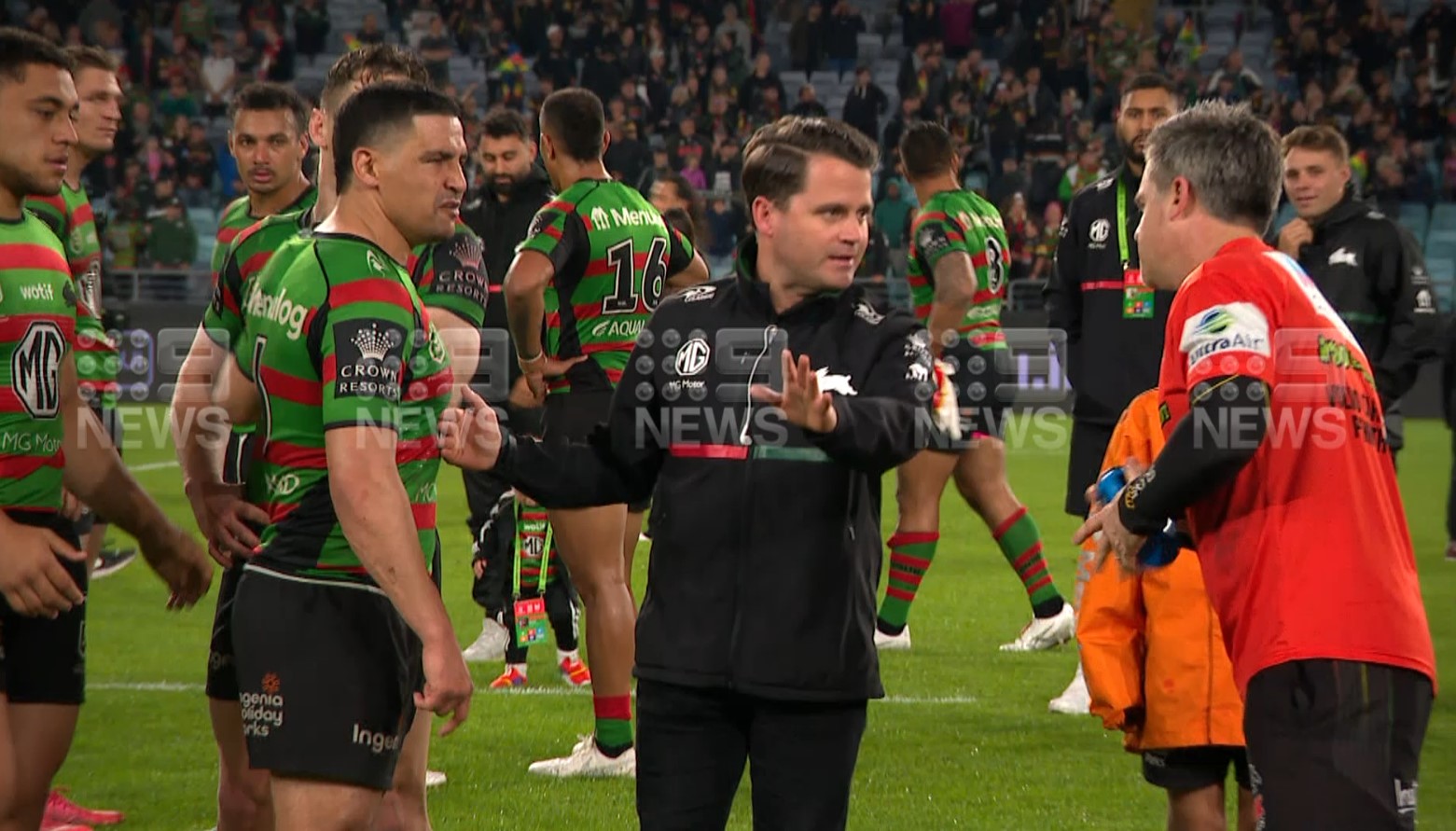 South Sydney star Cody Walker in a heated altercation with Penrith trainer Pete Green.