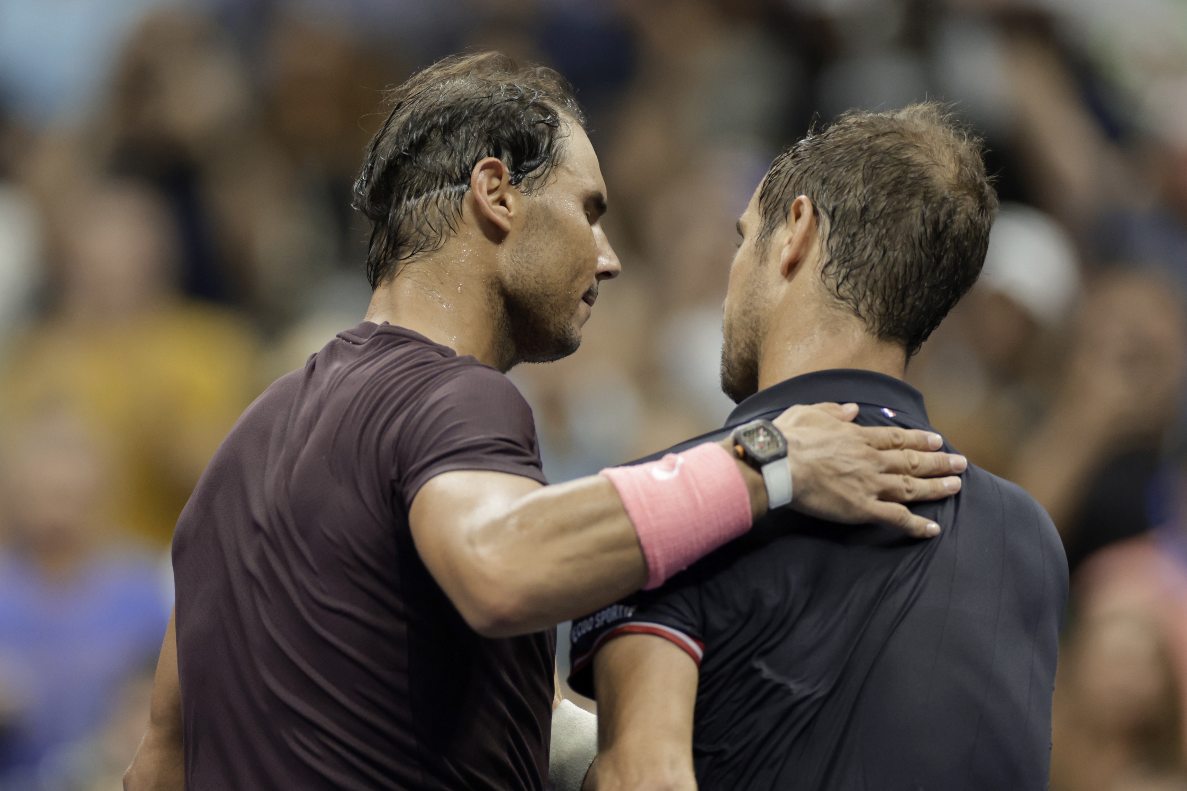 Rafael Nadal, left, of Spain, and Richard Gasquet, of France, greet each other after their match during the third round of the U.S. Open tennis championships, Saturday, Sept. 3, 2022, in New York. Nadal won the match. (AP Photo/Adam Hunger)