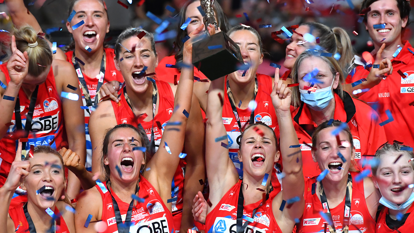 The Swifts celebrate winning the Super Netball grand final