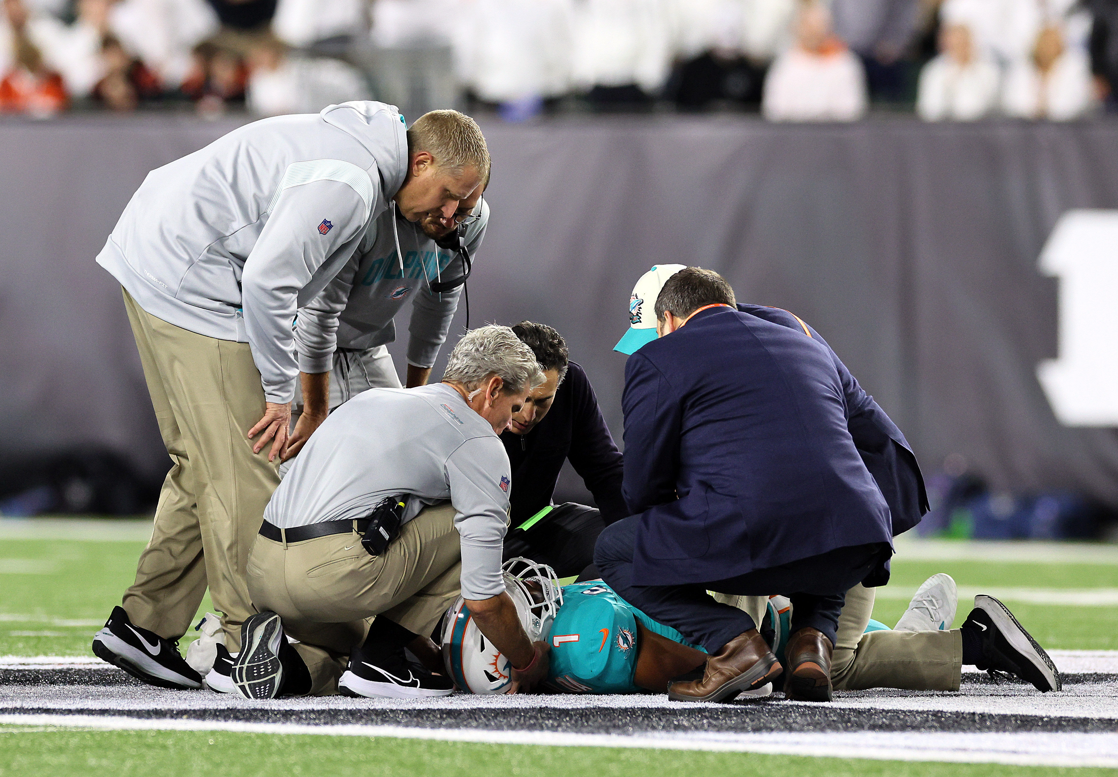 Medical staff tend to quarterback Tua Tagovailoa of the Miami Dolphins.