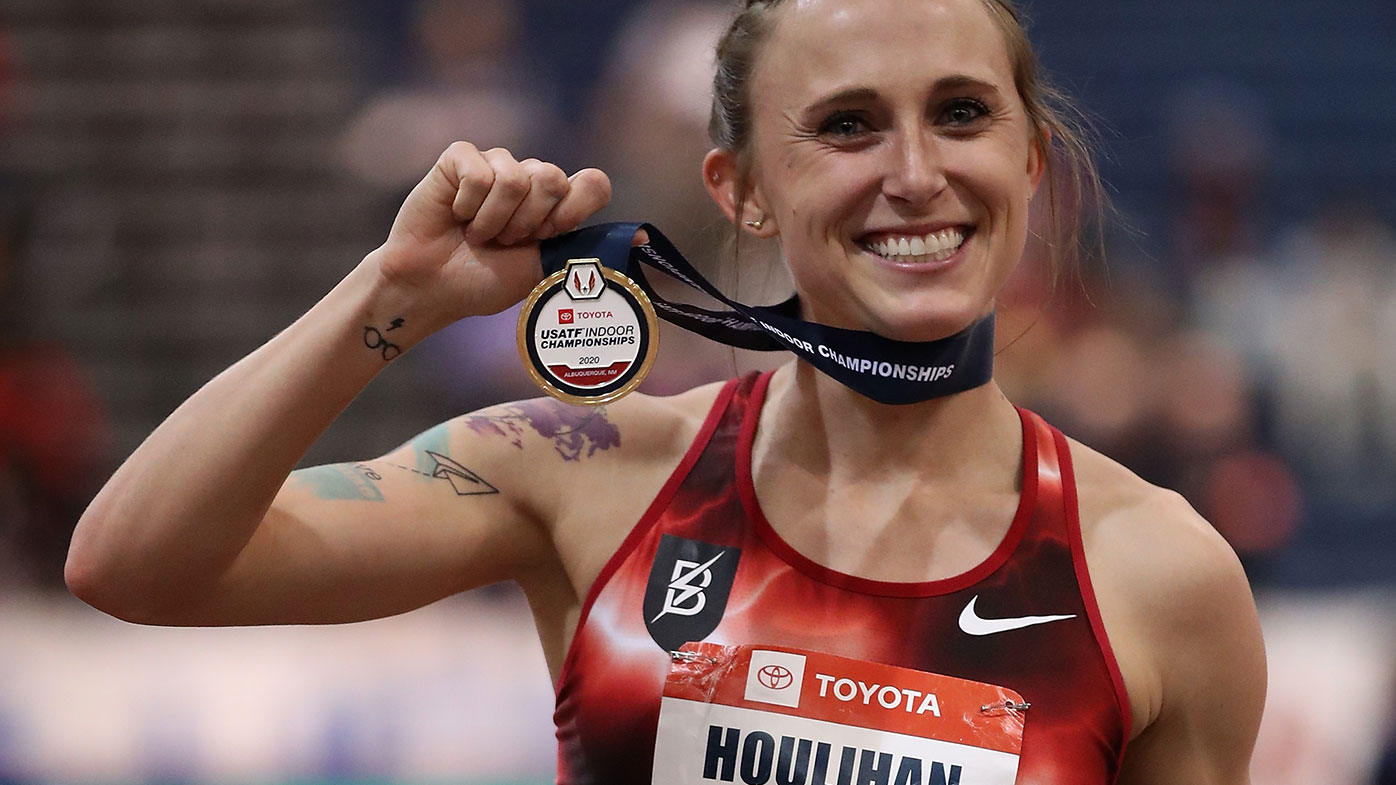 Shelby Houlihan poses with her medal after winning the Women's 3000 metres during the 2020 Toyota USATF Indoor Championships.