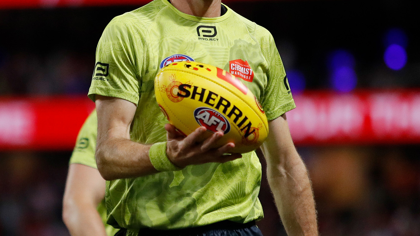  An AFL umpire has been arrested after suspicious betting on the Brownlow Medal was identified.