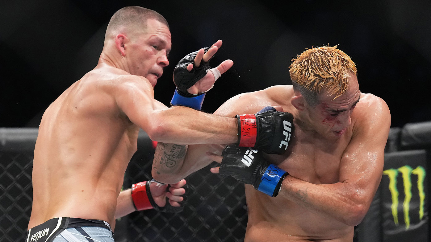 Nate Diaz punches Tony Ferguson at UFC 279