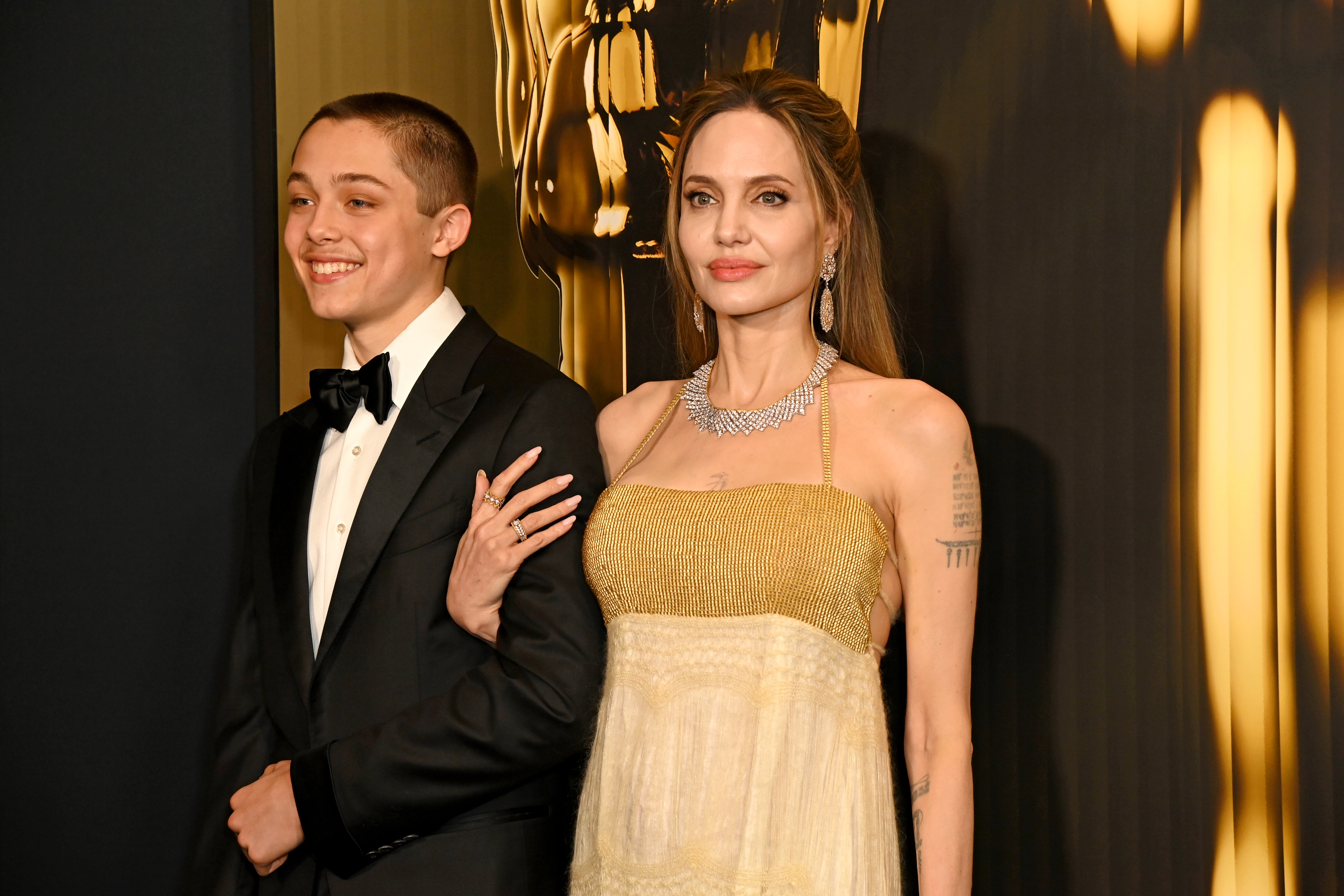 Knox Jolie-Pitt and Angelina Jolie attend the 2024 Governors Awards at Dolby Theatre on November 17, 2024 in Hollywood, California. 