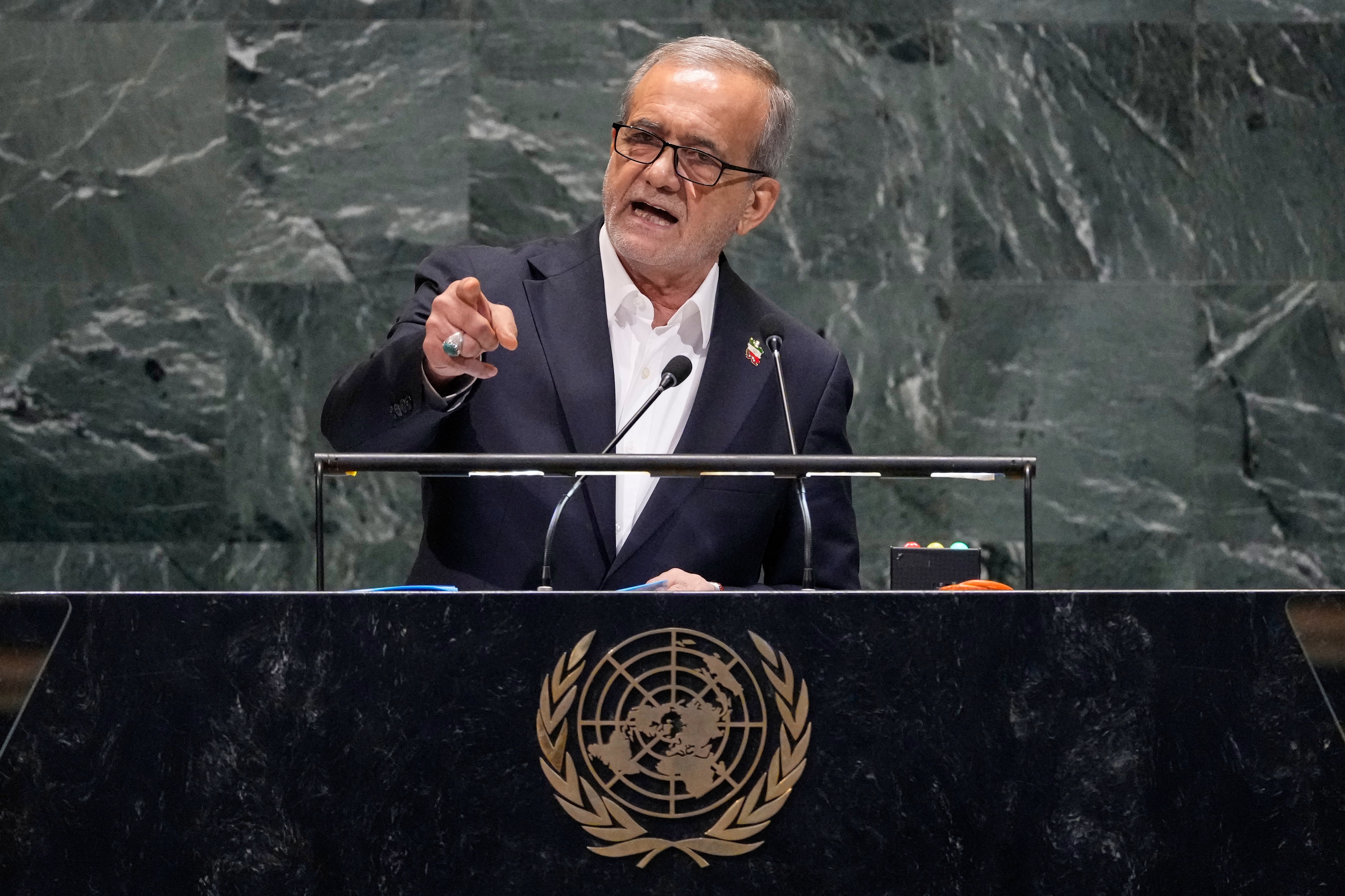 Iran President Masoud Pezeshkian addresses the 80th session of the United Nations General Assembly, Wednesday, Sept. 24, 2025. (AP Photo/Richard Drew)
