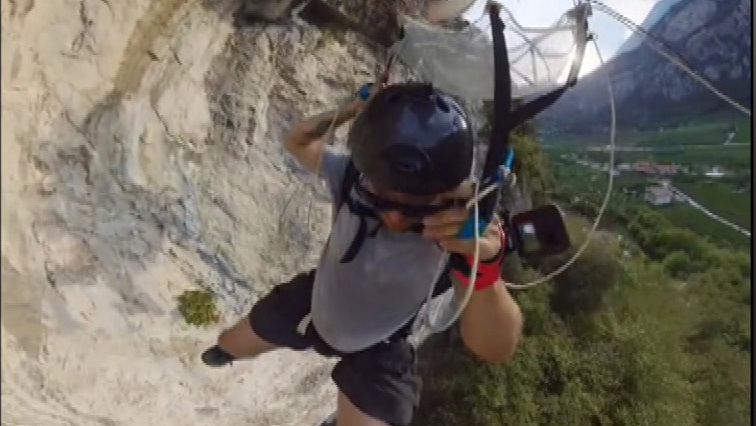'I'm hanging from a tree': Base jumper stuck after dangerous mishap