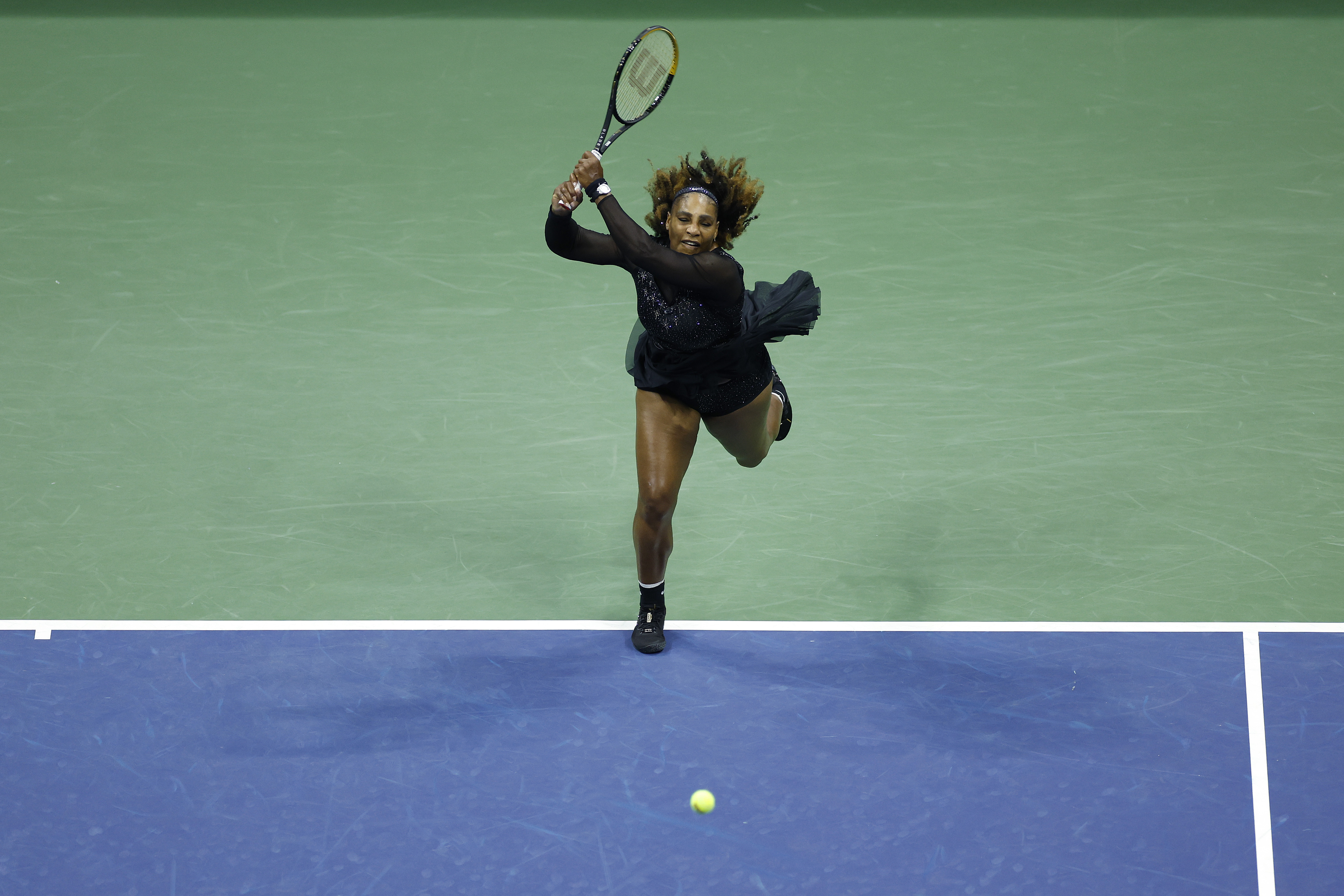 Serena Williams of the United States returns a shot against Anett Kontaveit of Estonia.